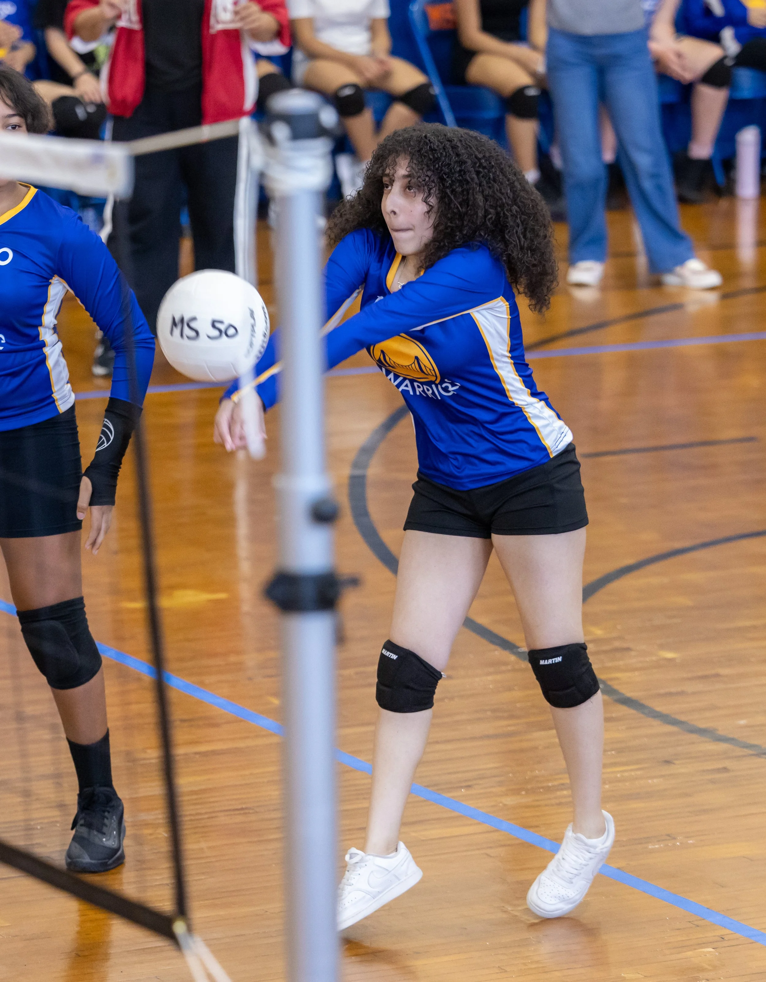 MS 50 students playing volleyball