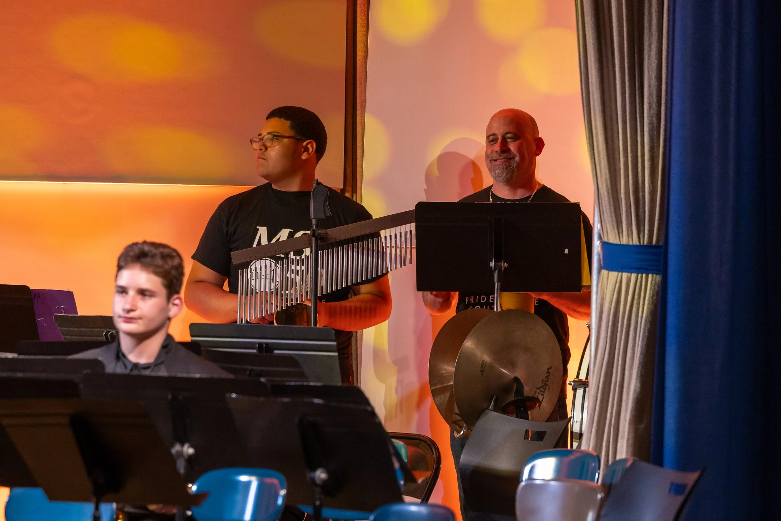 middle school students perform in band concert