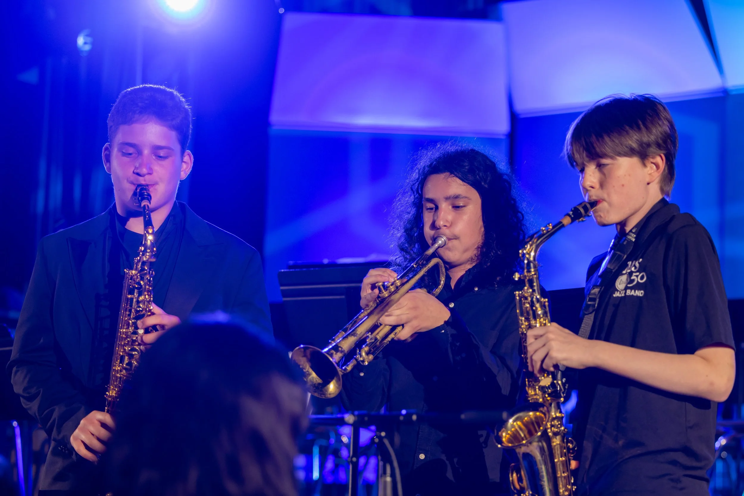 middle school students perform in band concert