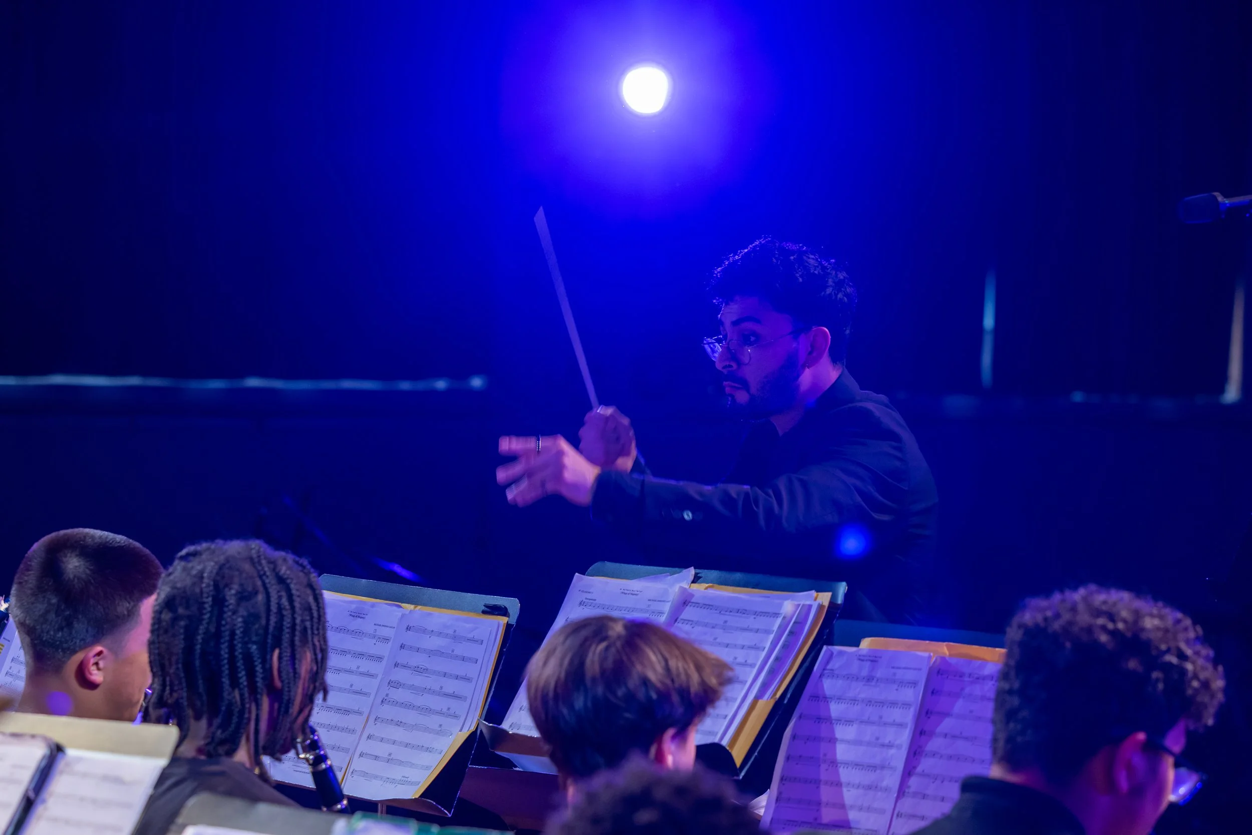 middle school students perform in band concert