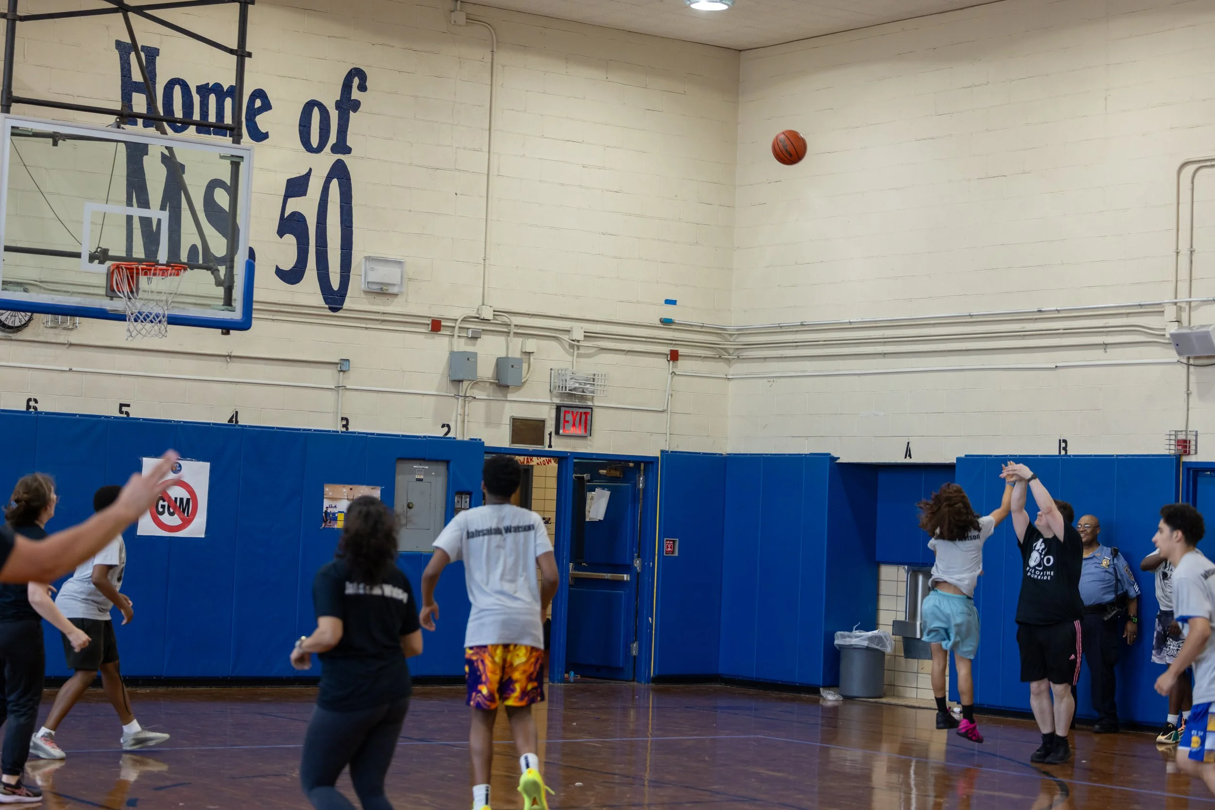 student versus staff basketball game