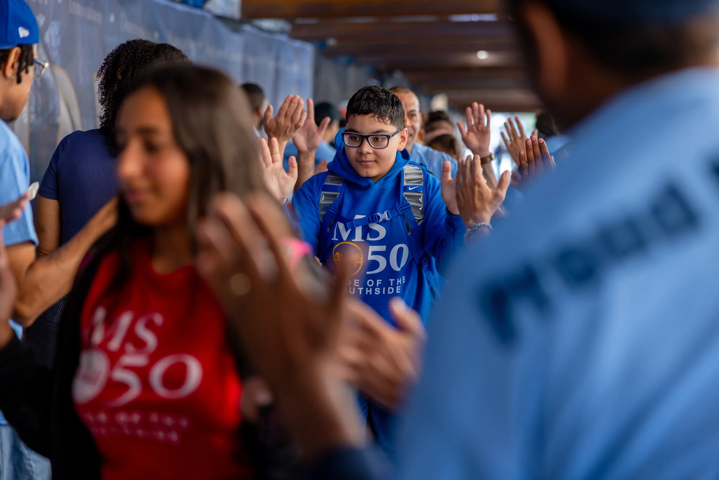 Students get high fives from parents