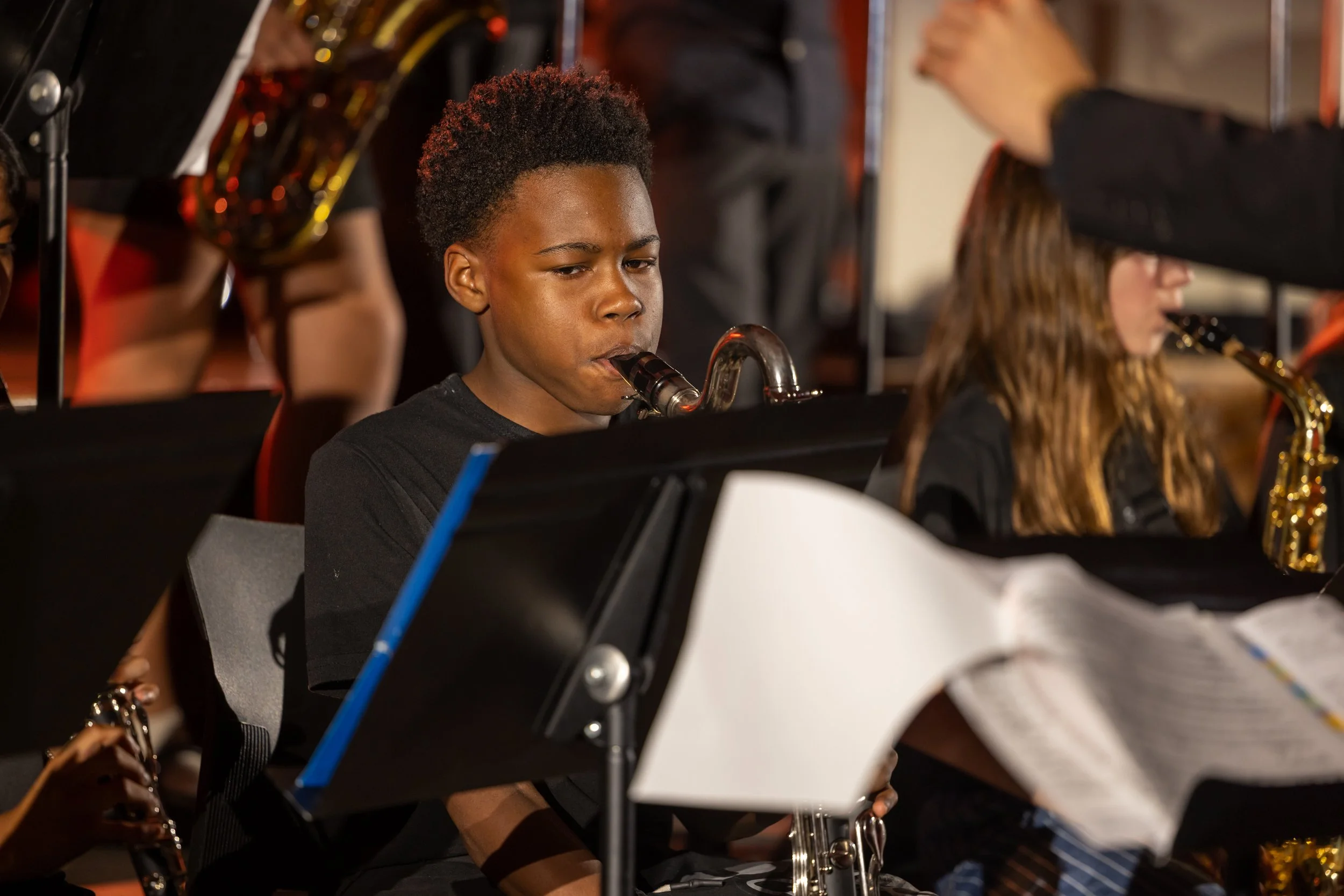 middle school students perform in band concert