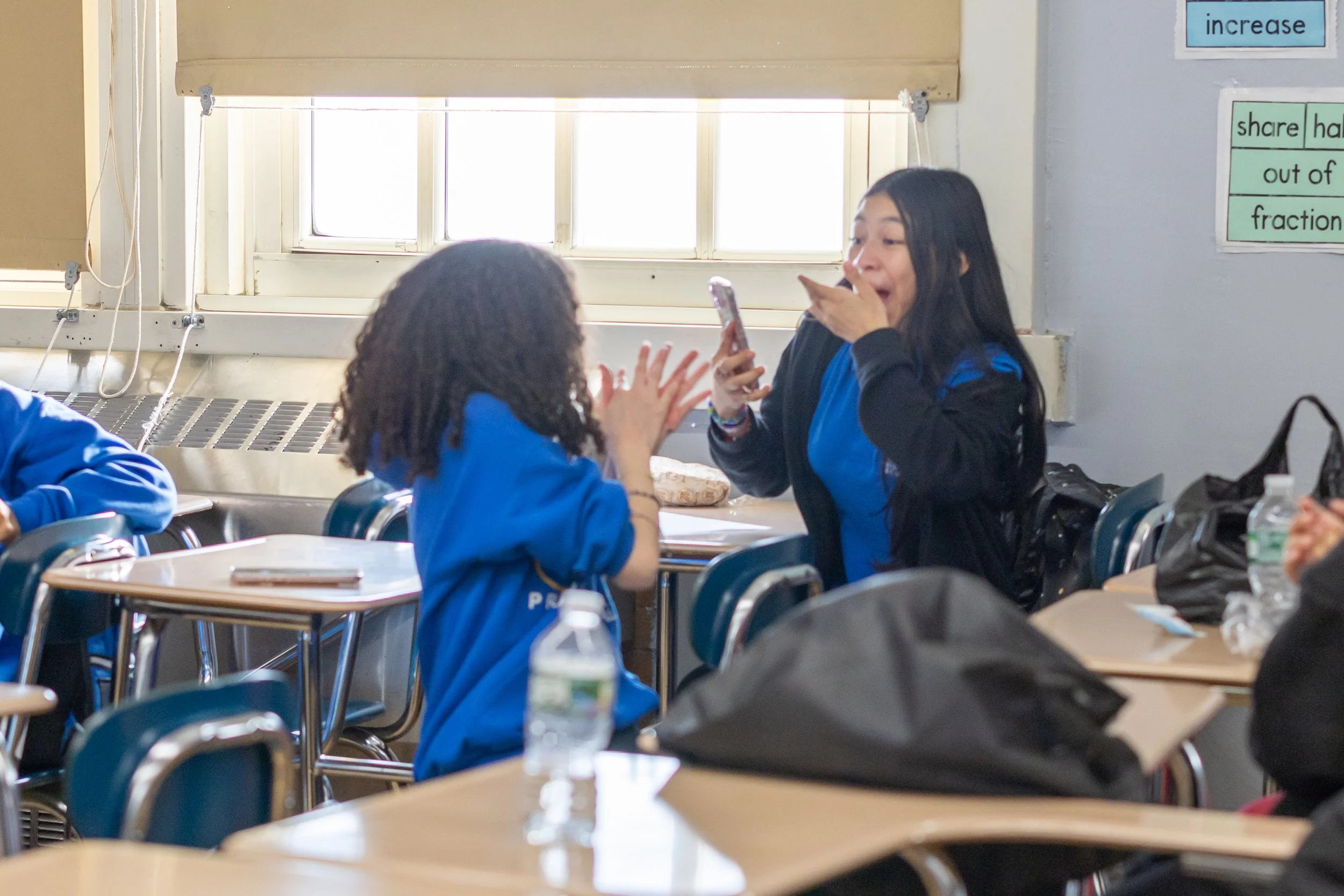 Debaters celebrate their wins