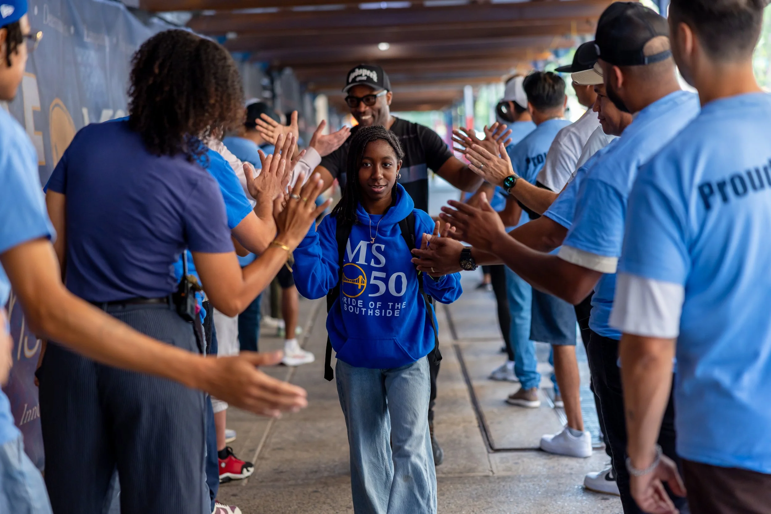Students get high fives from parents