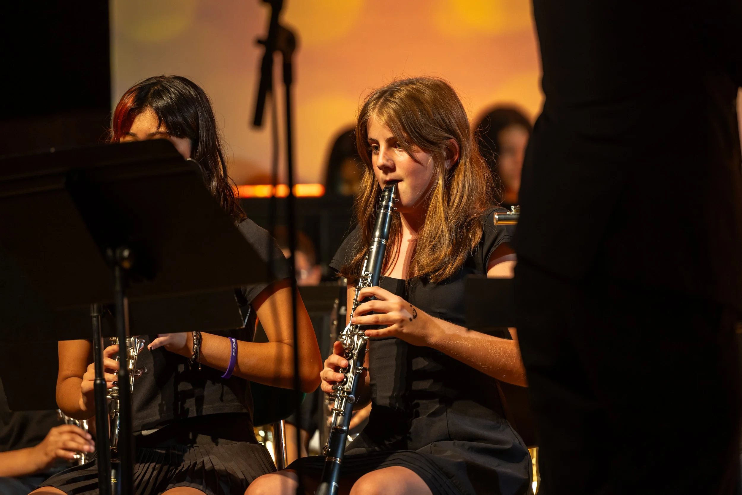 middle school students perform in band concert