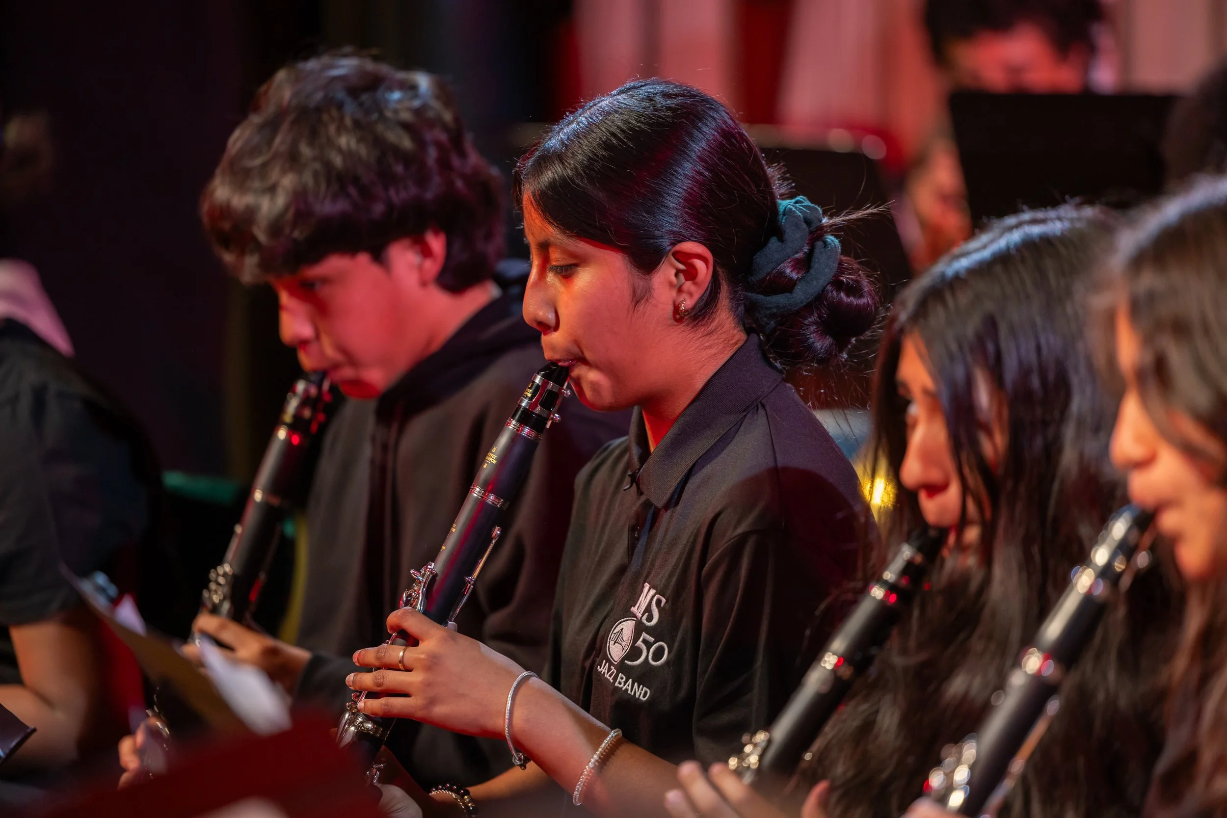 middle school students perform in band concert