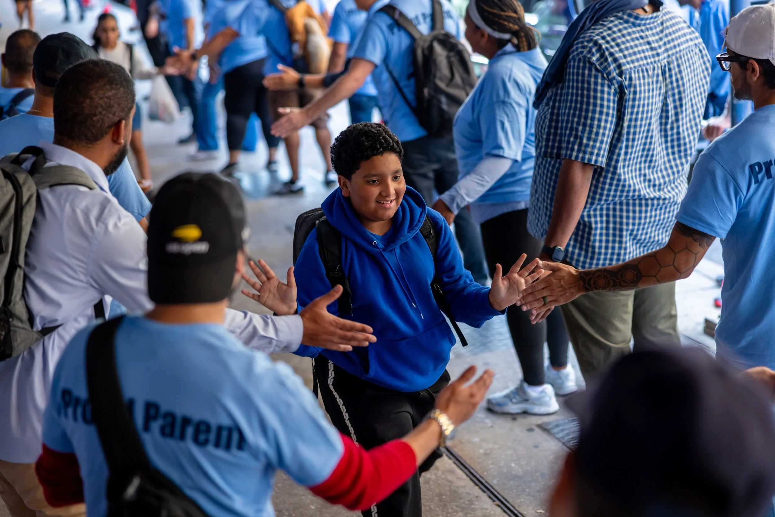 Students get high fives from parents