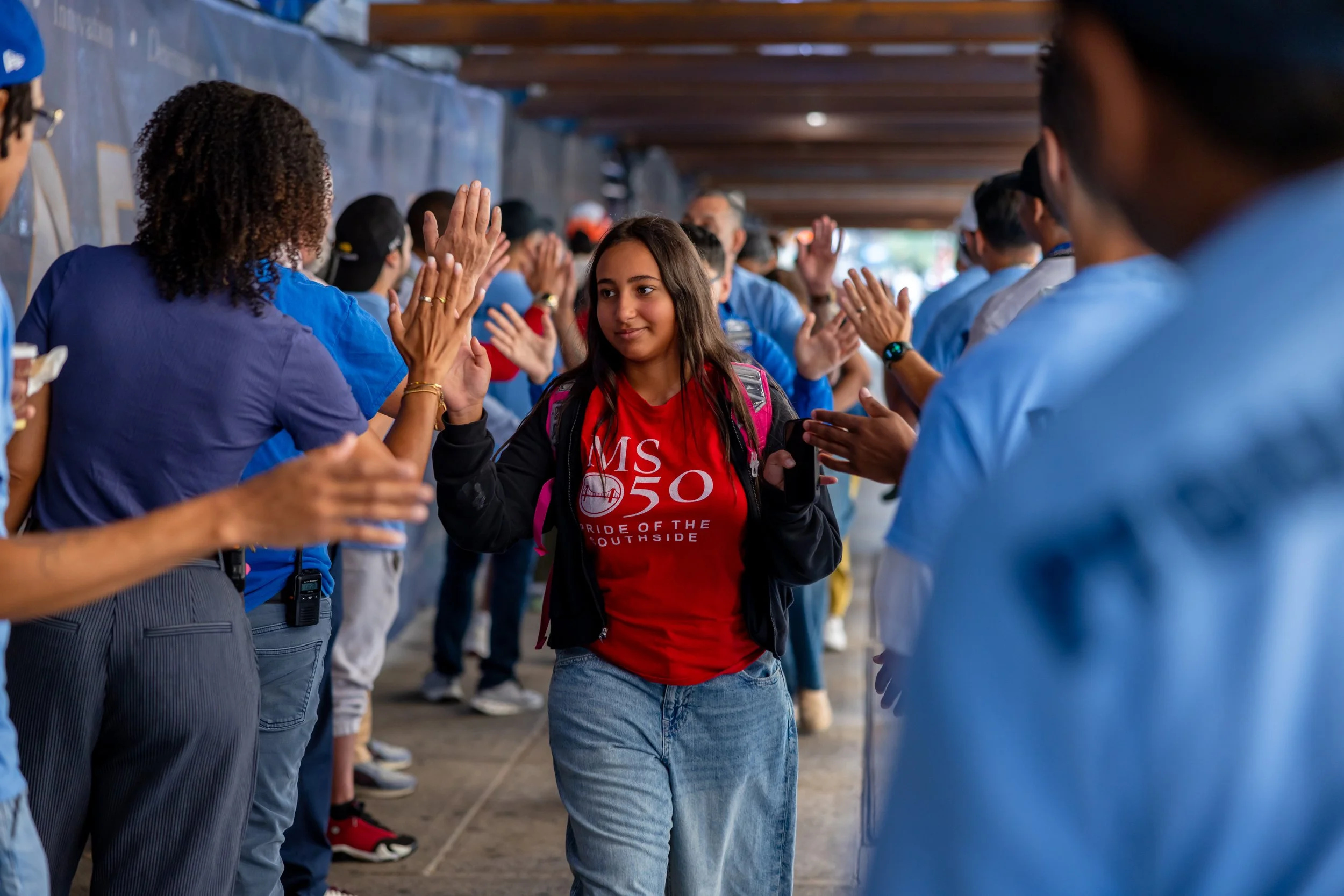 Students get high fives from parents
