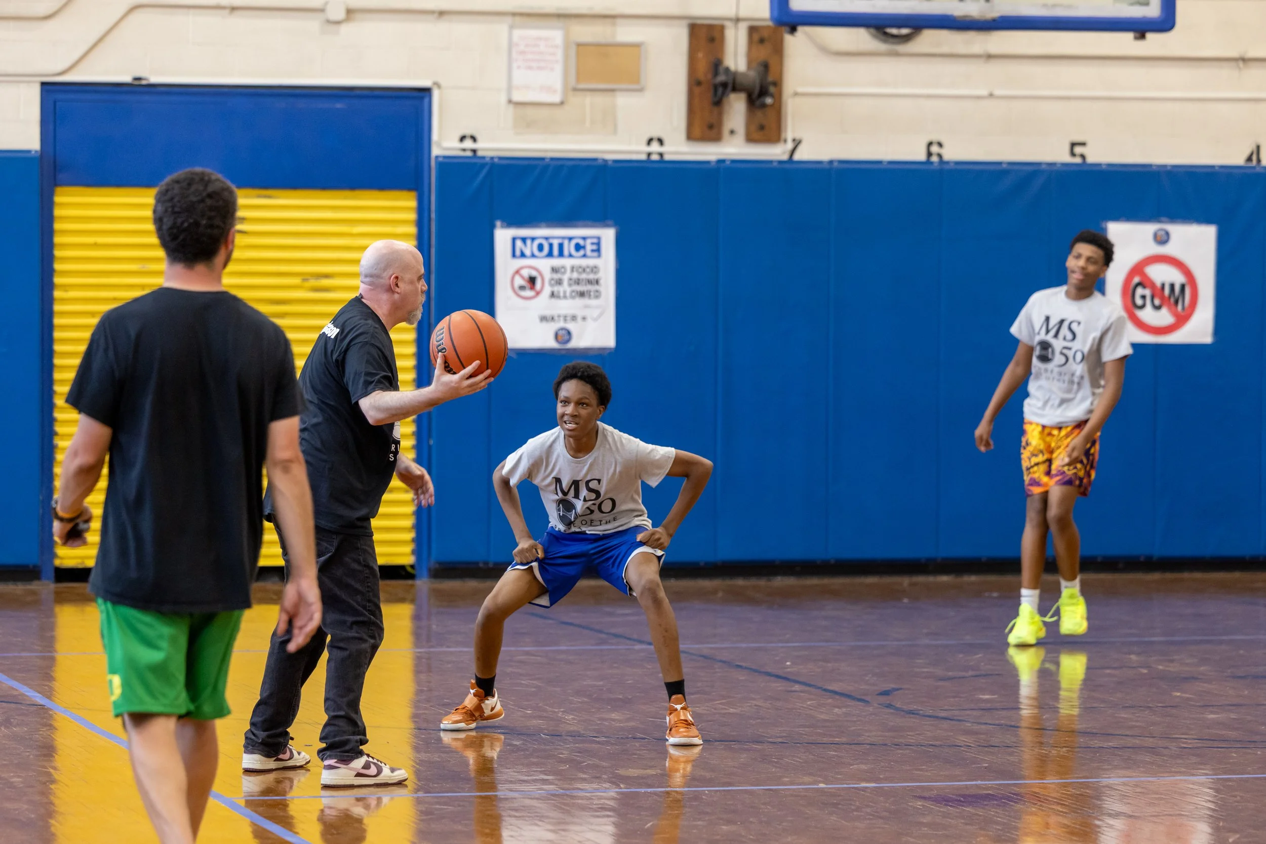 student versus staff basketball game