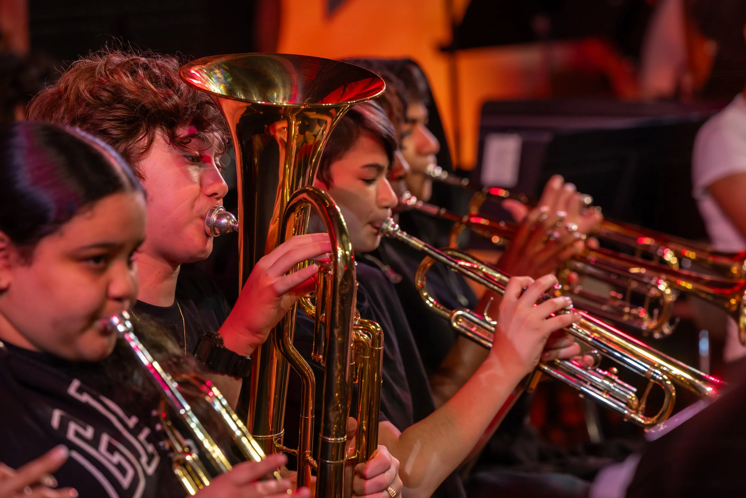 middle school students perform in band concert