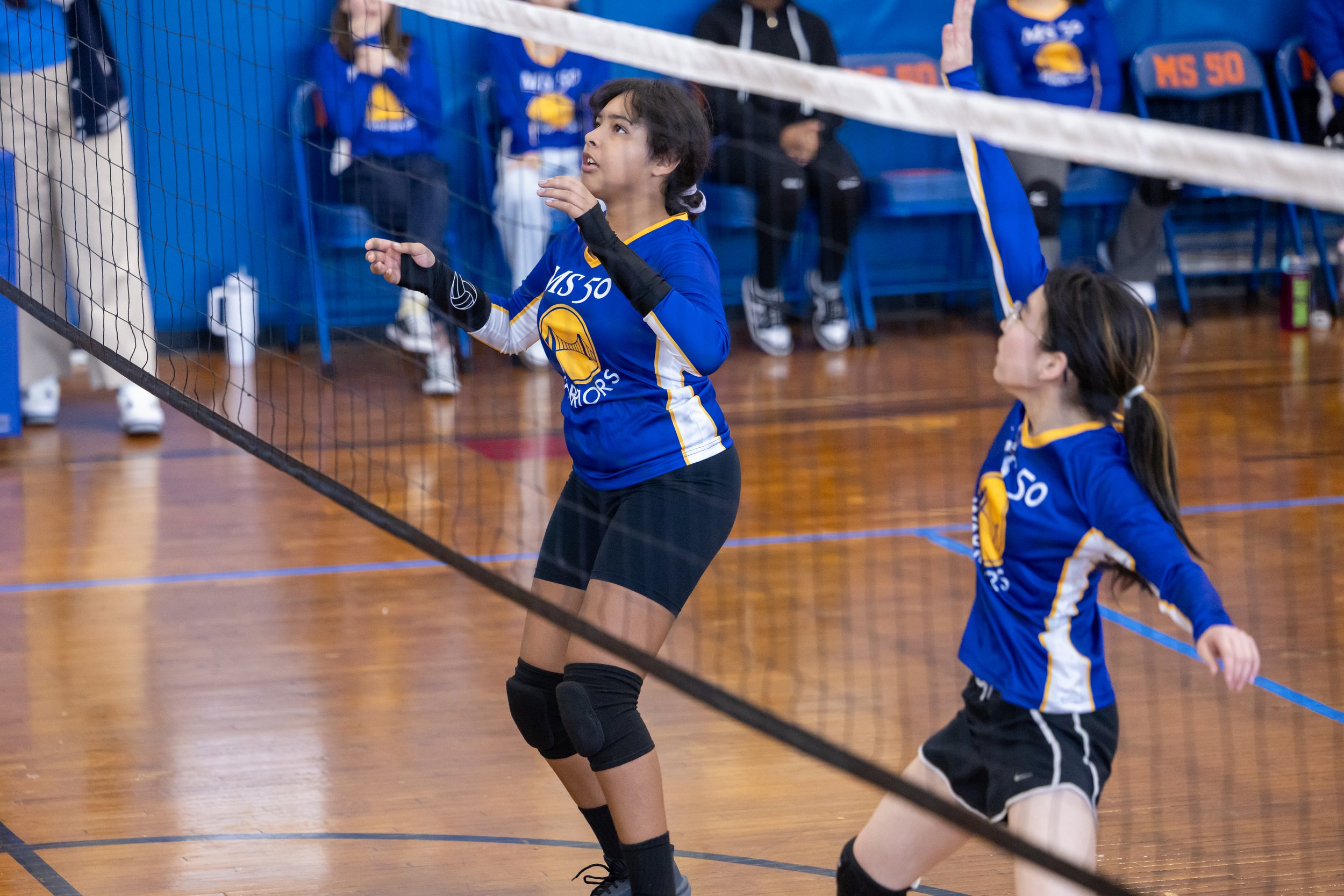 MS 50 students playing volleyball