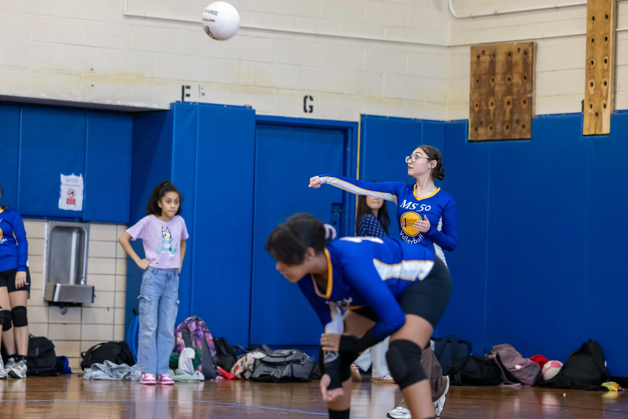 MS 50 students playing volleyball
