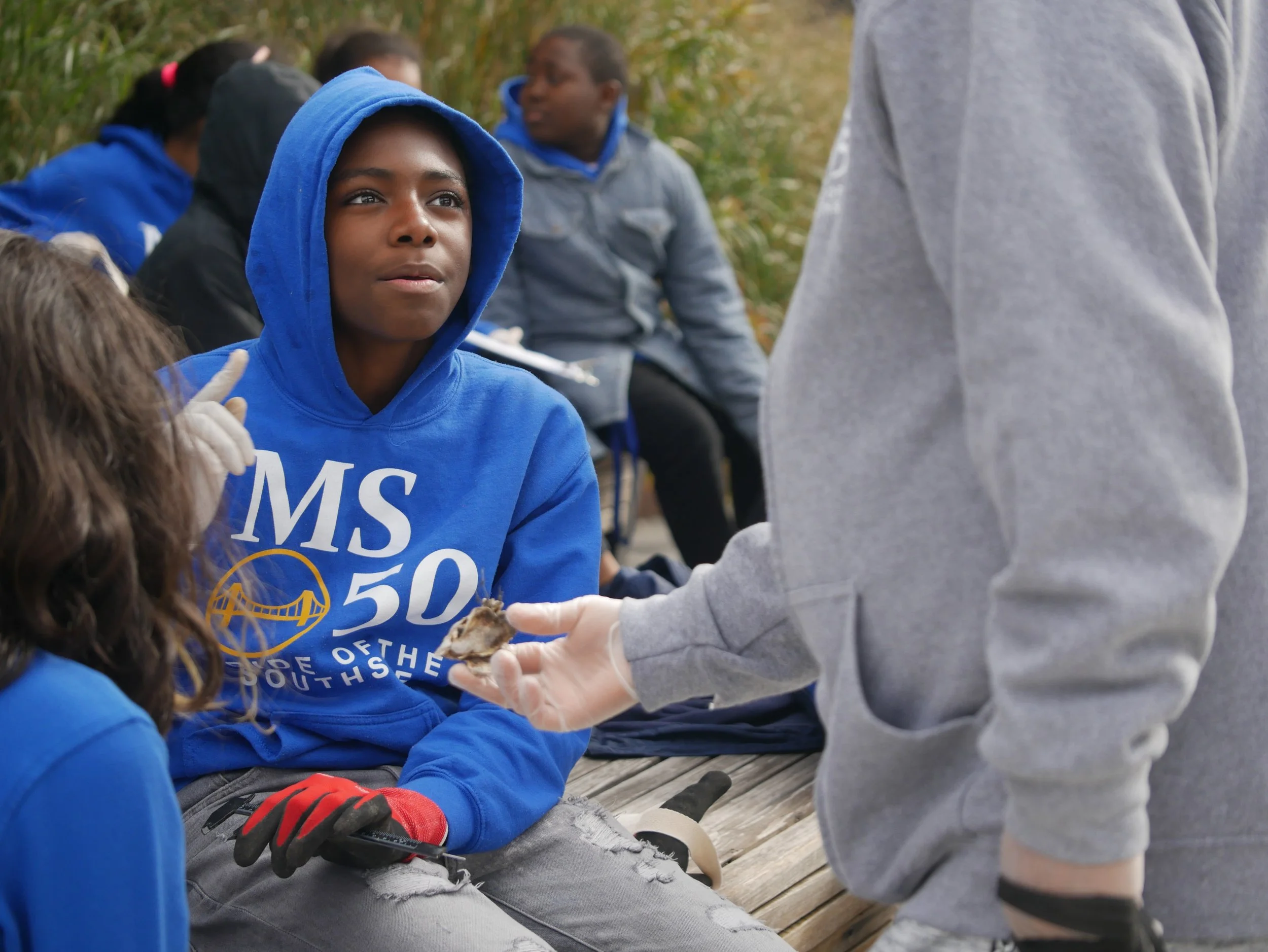 student talks with teacher