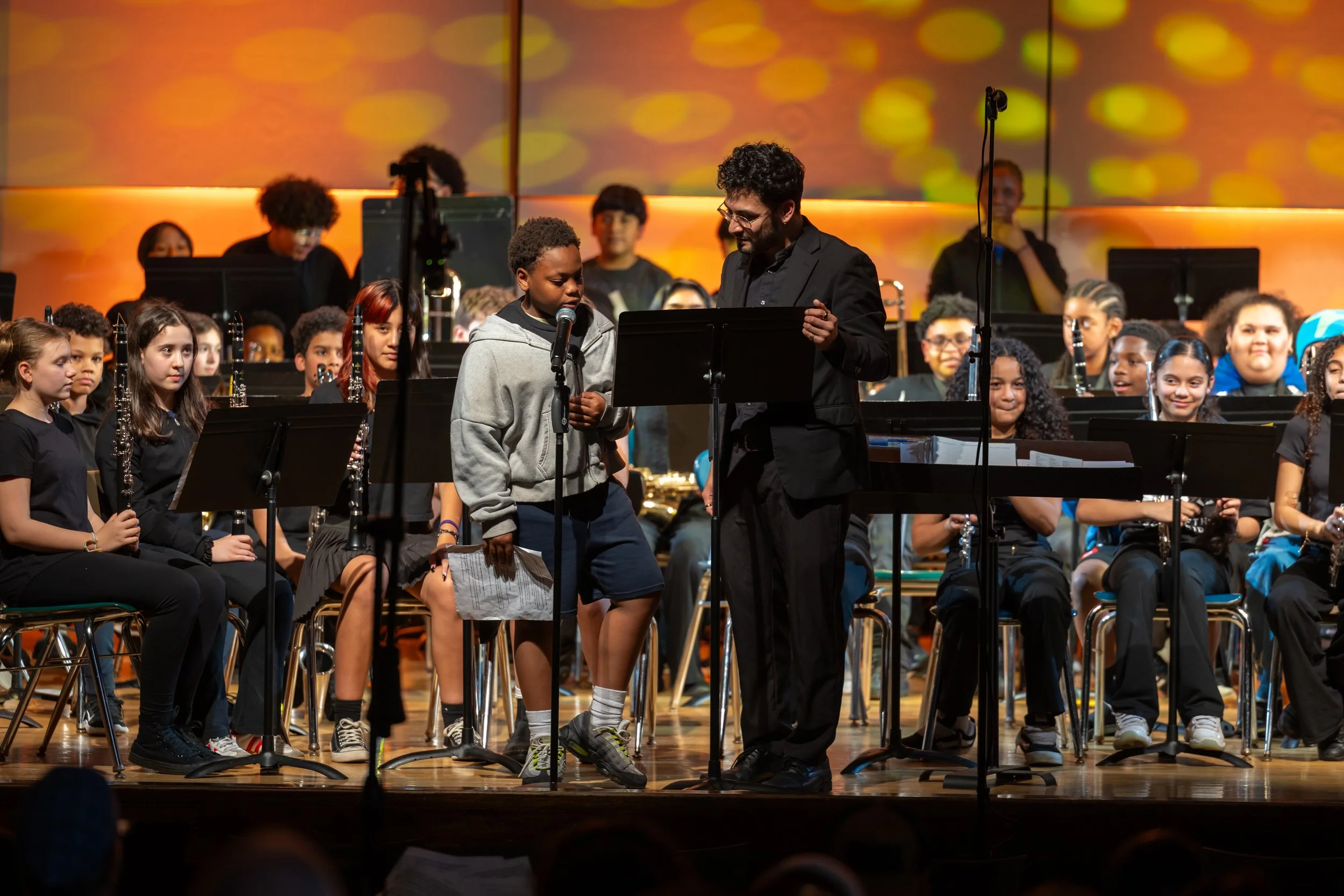 middle school students perform in band concert