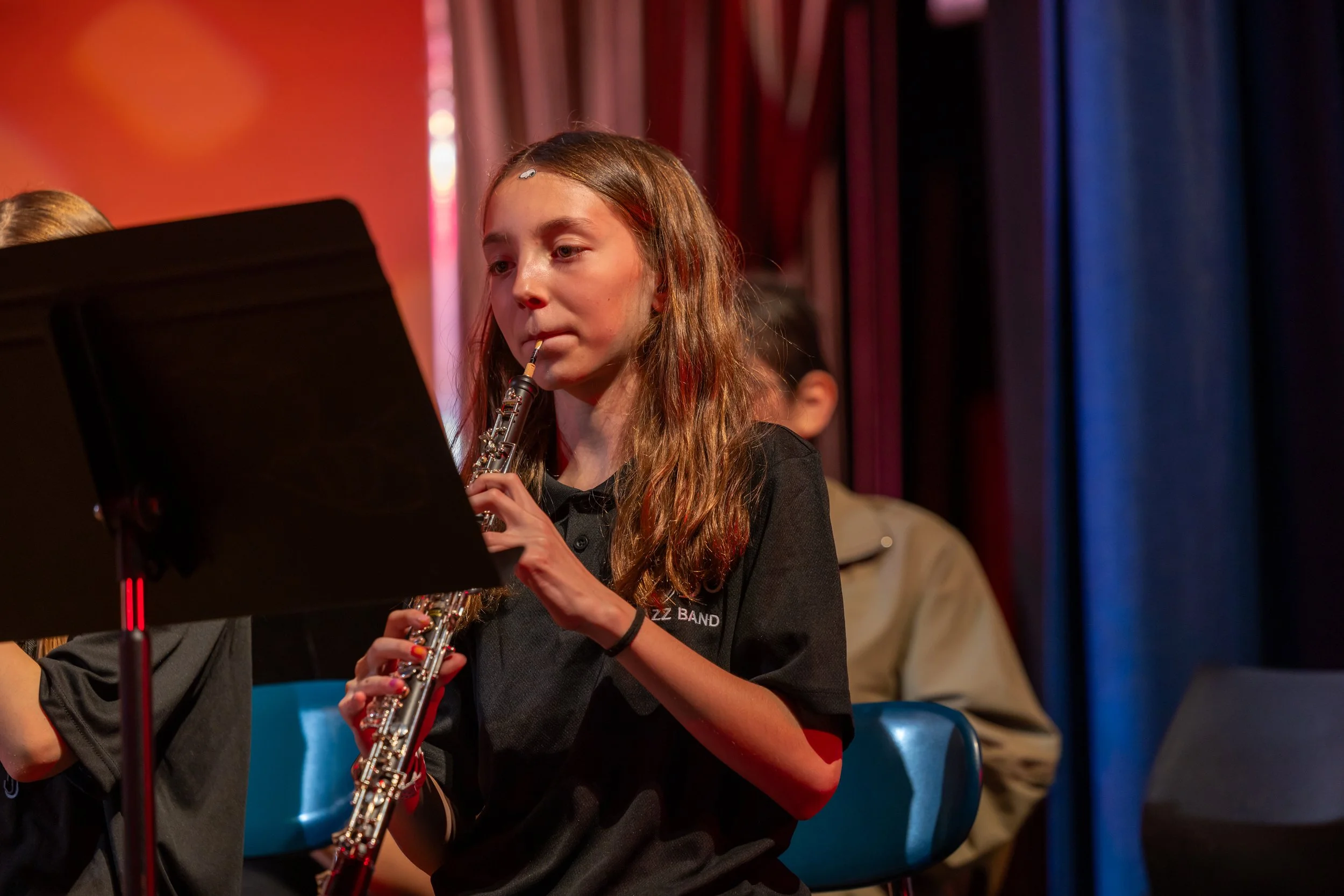 middle school students perform in band concert
