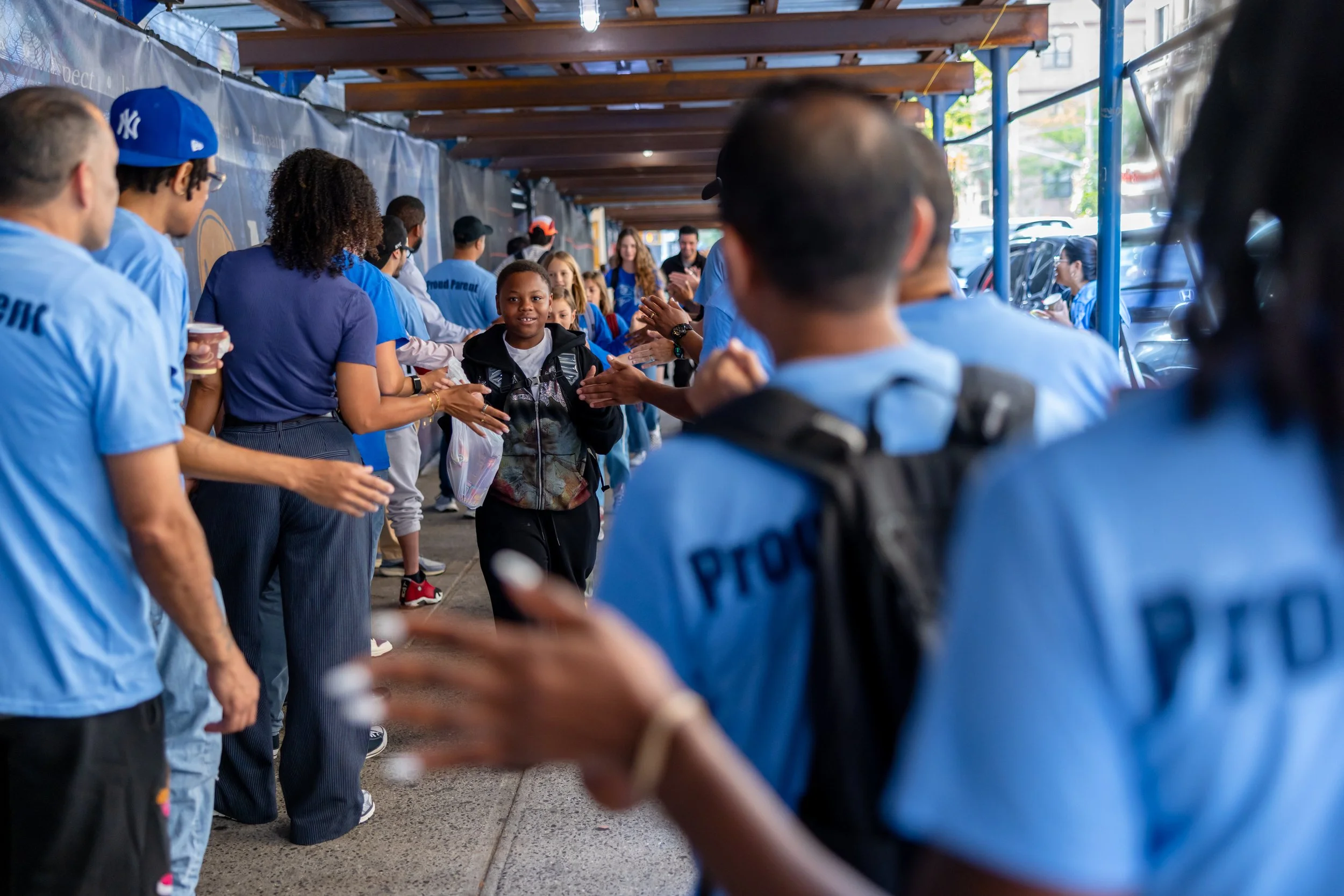 Students get high fives from parents