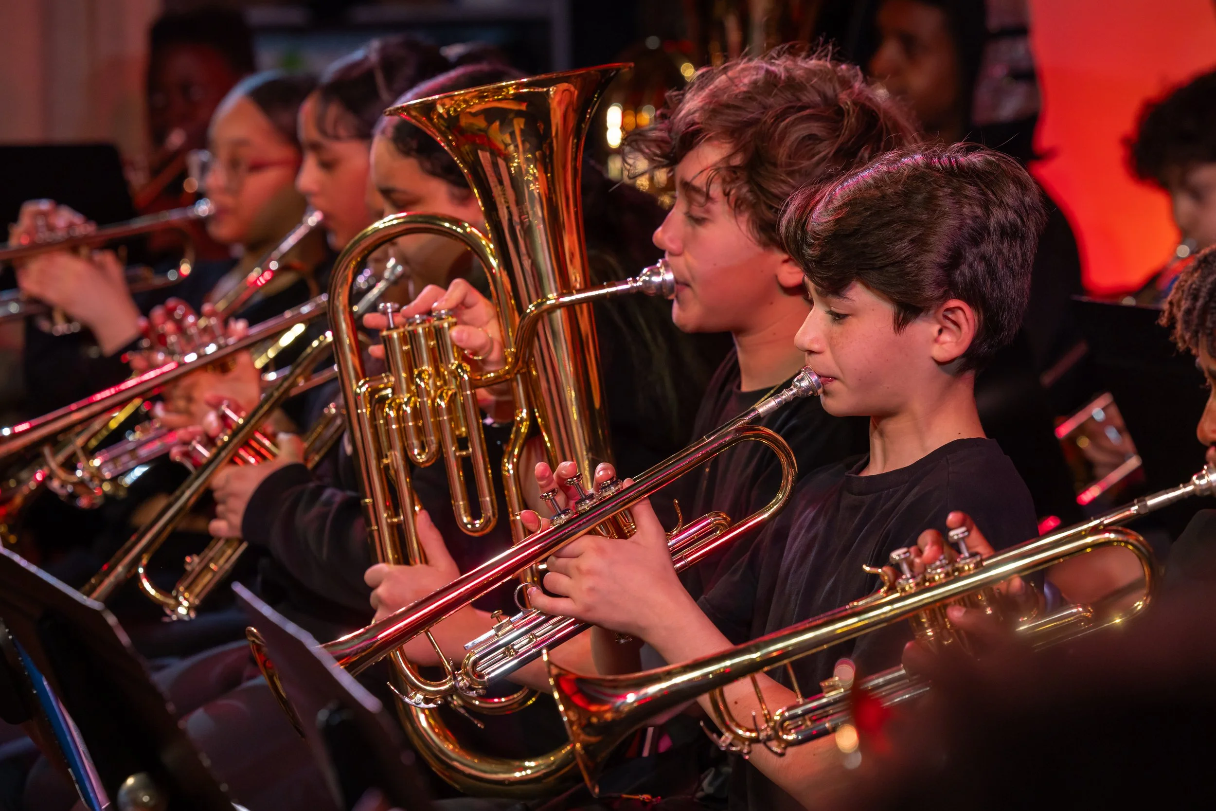 middle school students perform in band concert