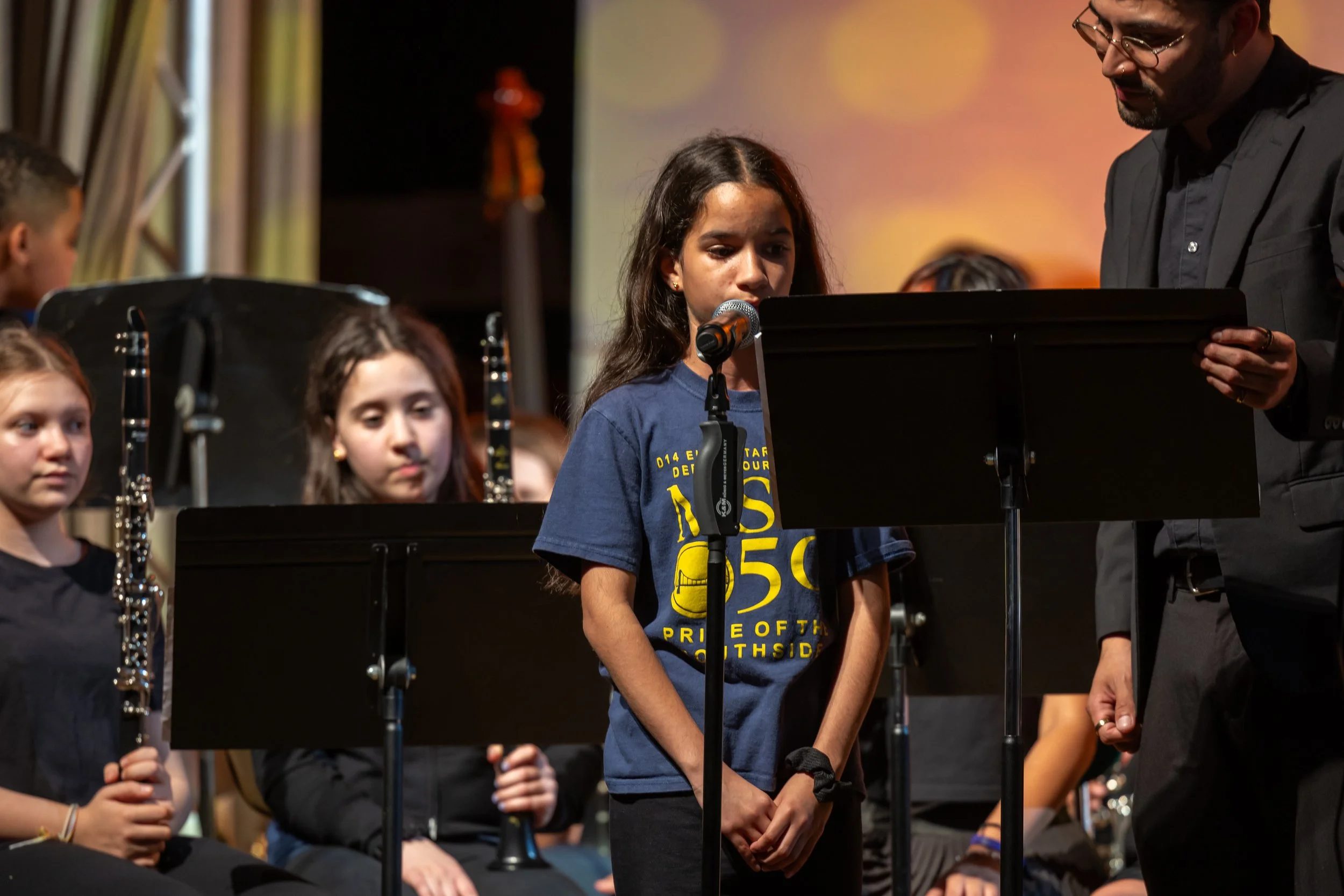 middle school students perform in band concert