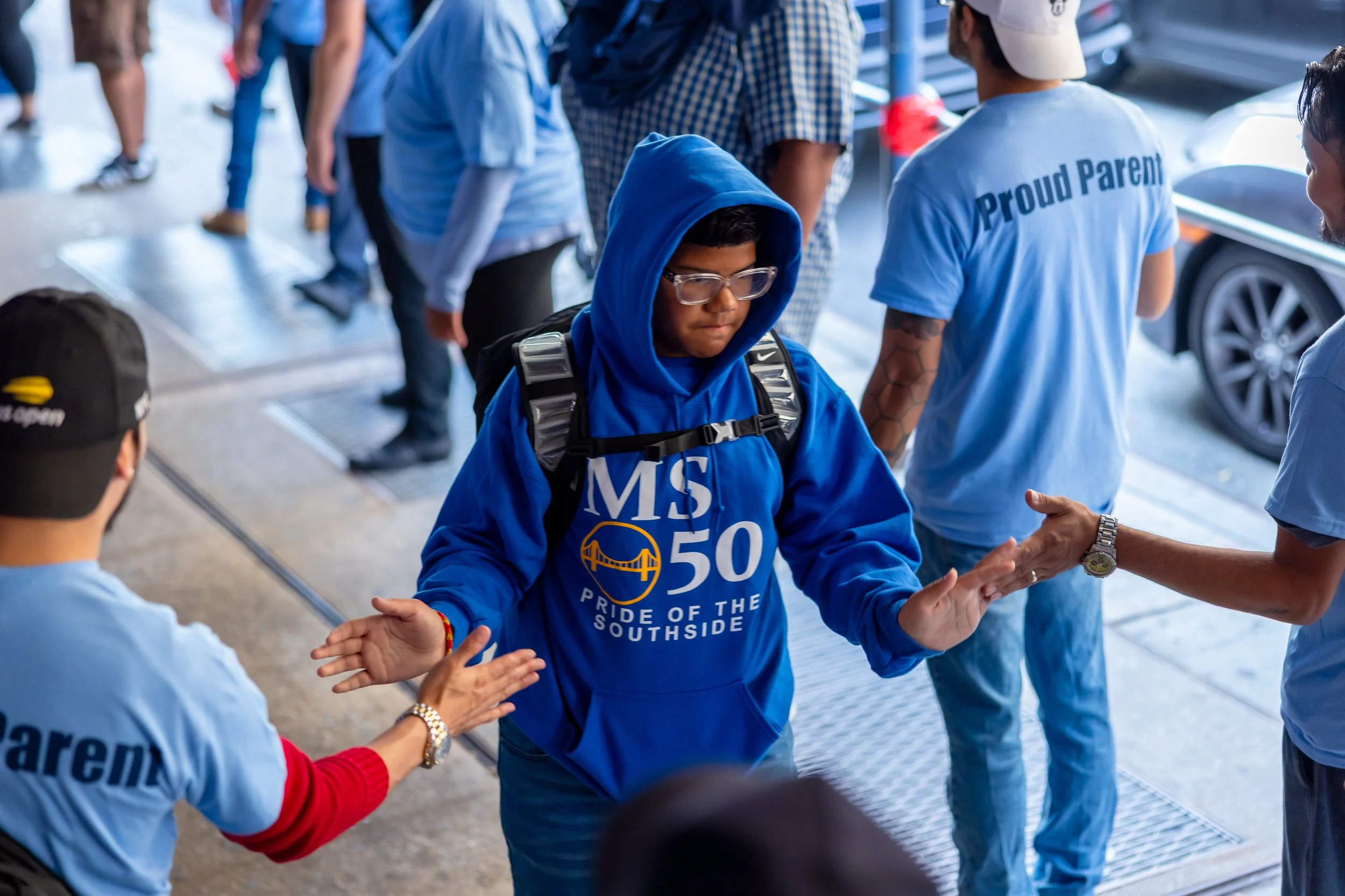 Students get high fives from parents