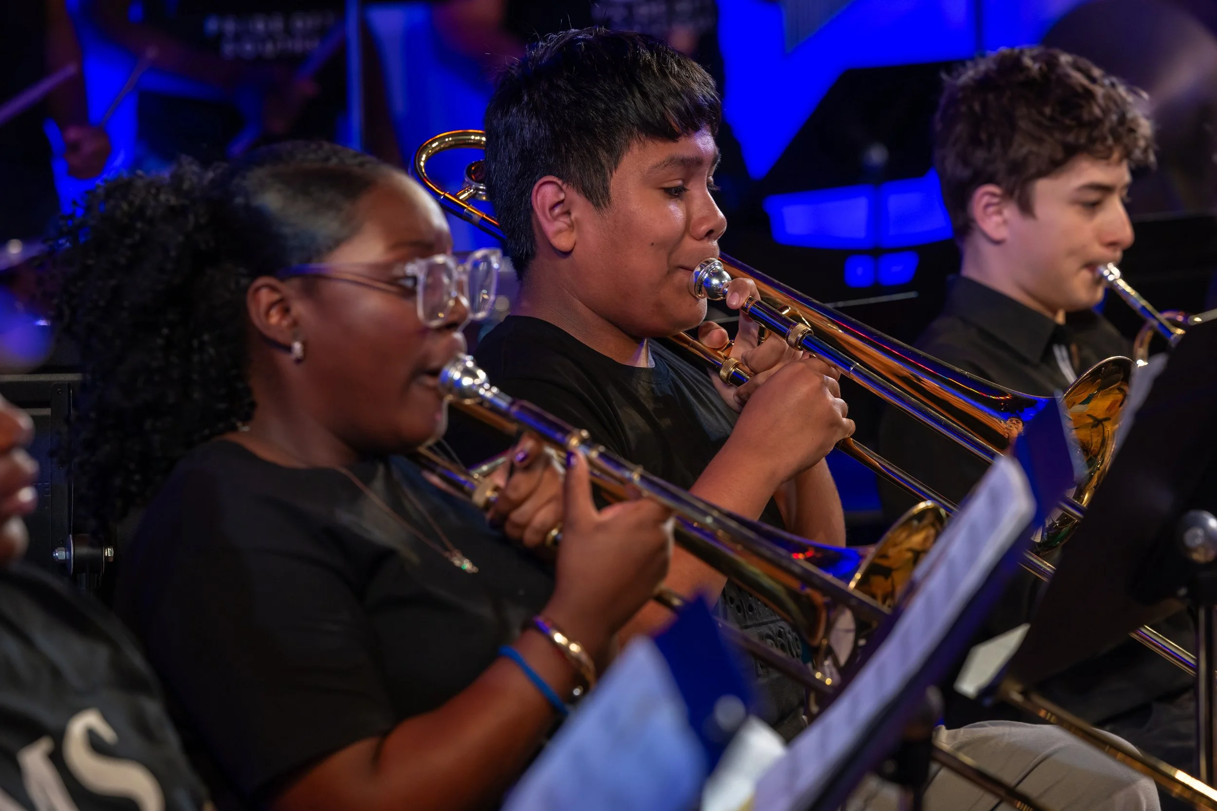 middle school students perform in band concert
