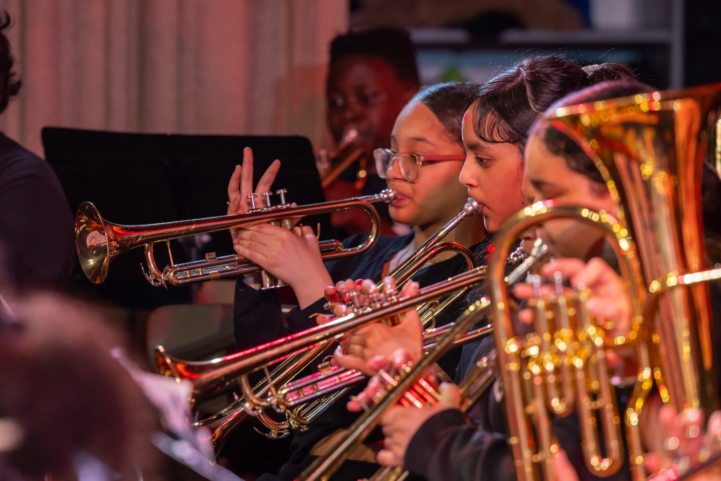 middle school students perform in band concert