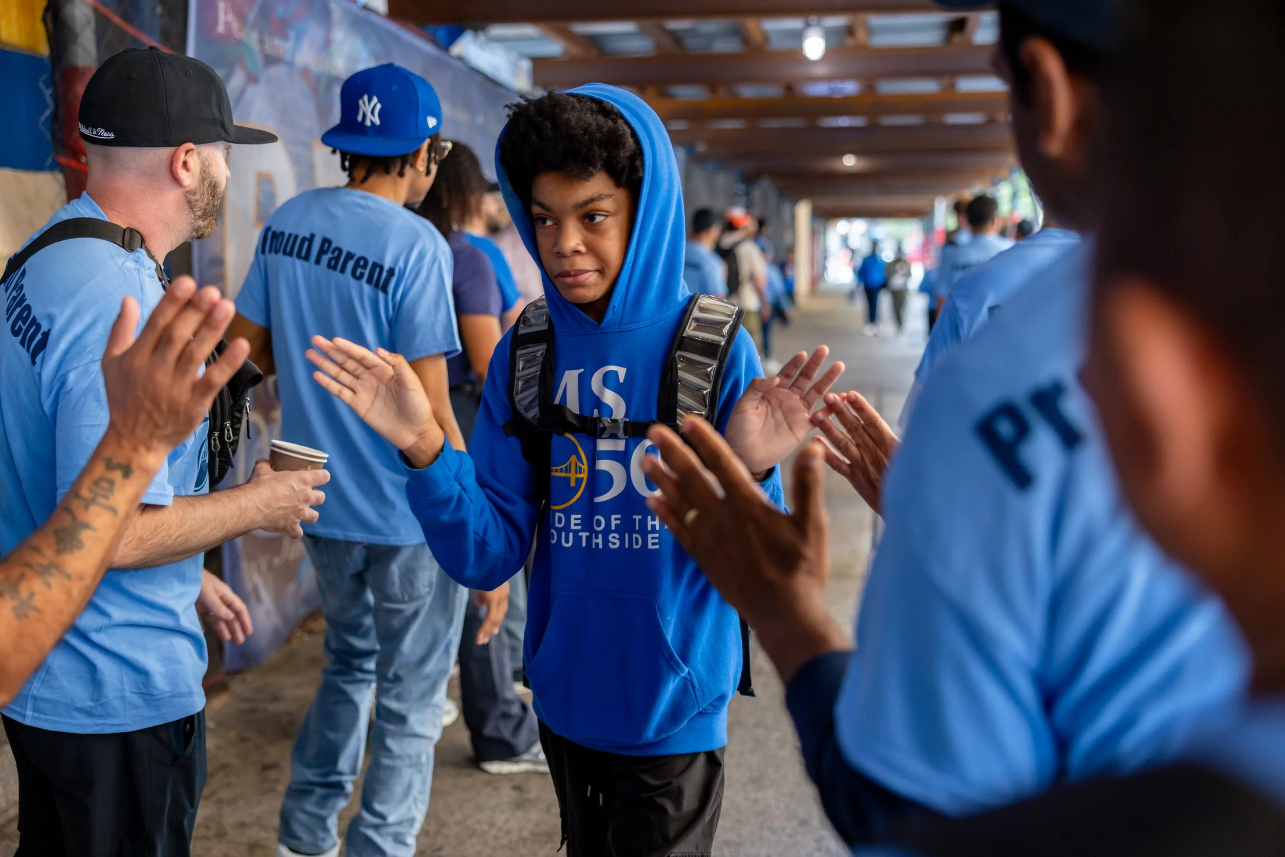 Students get high fives from parents