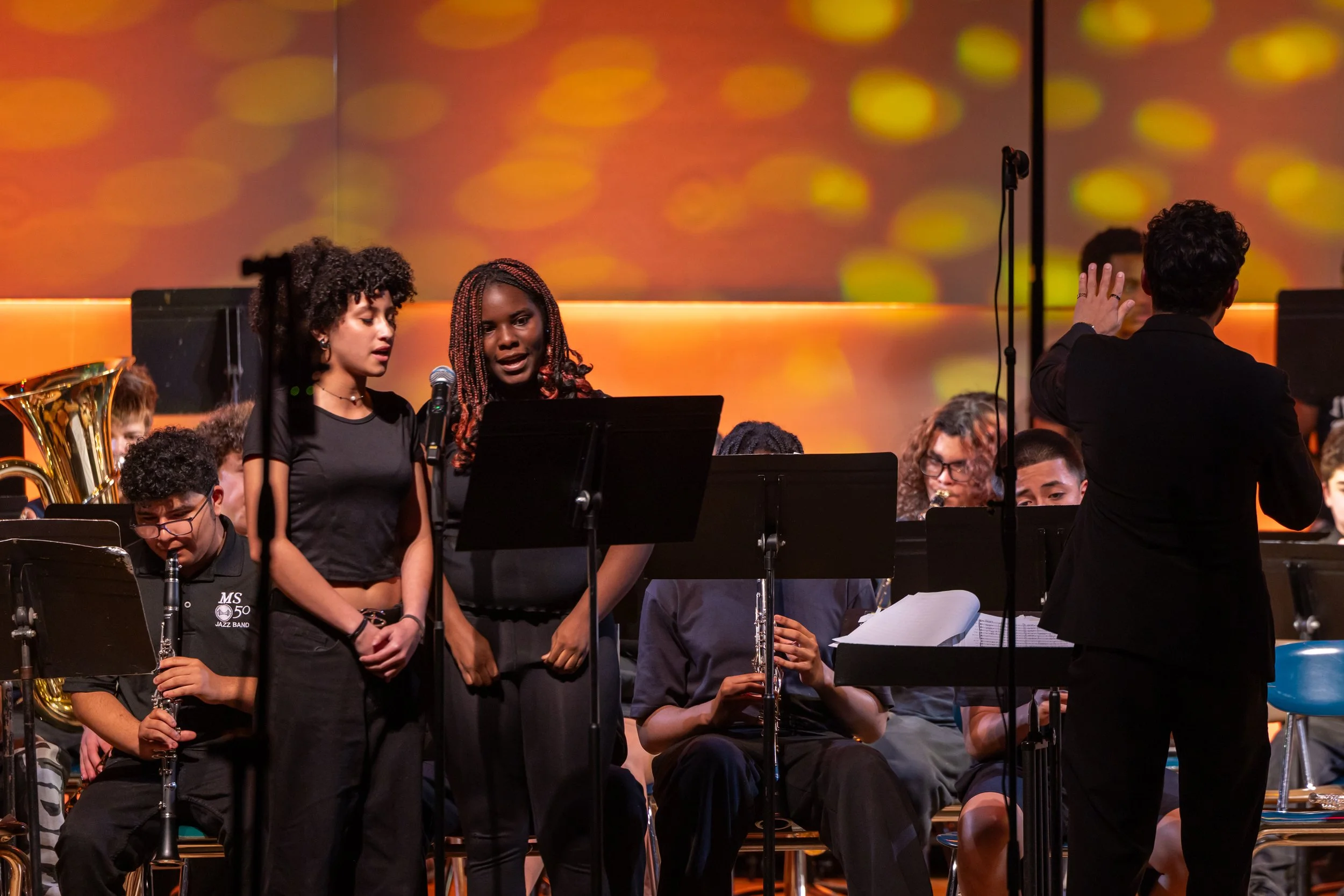 middle school students perform in band concert