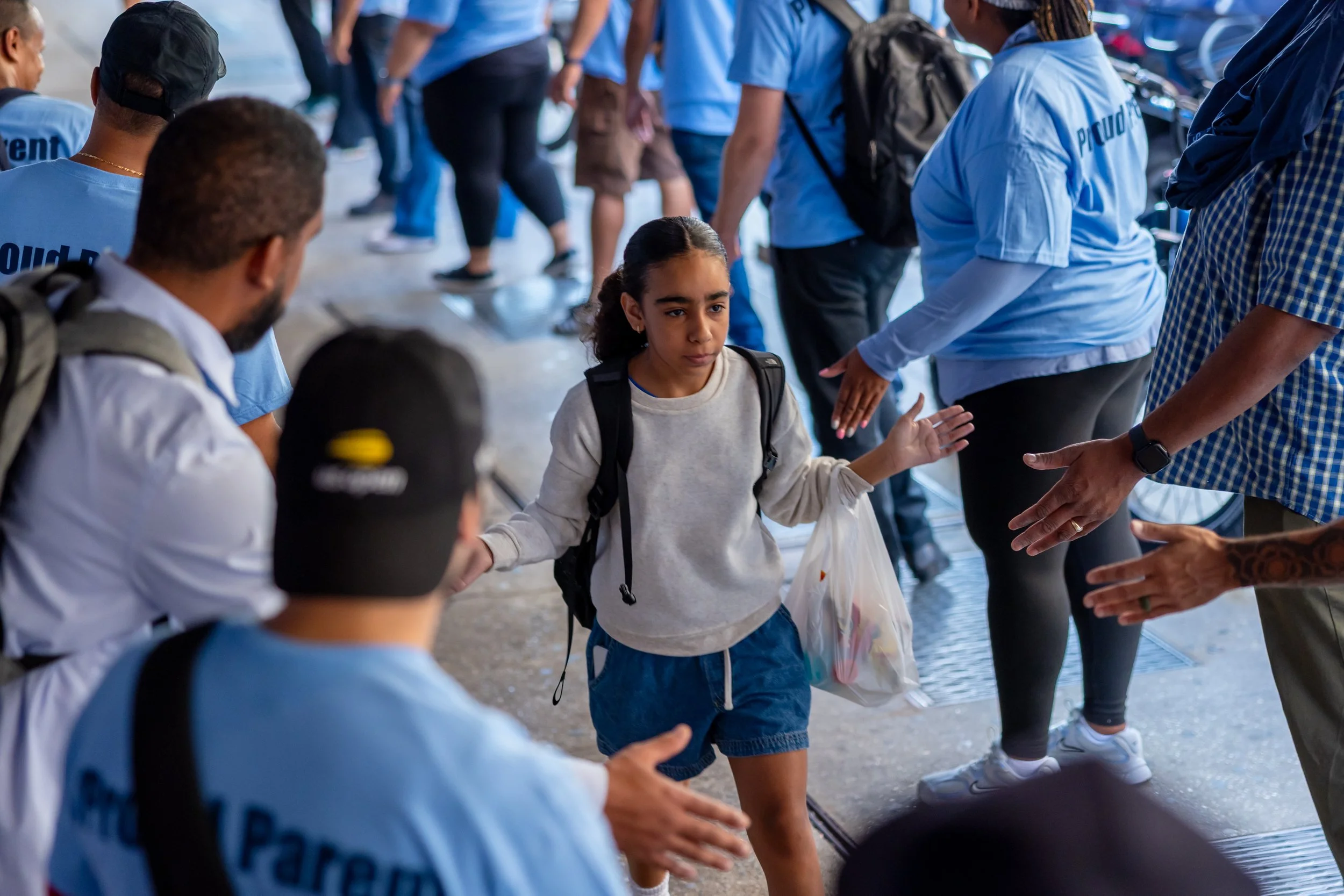 Students get high fives from parents
