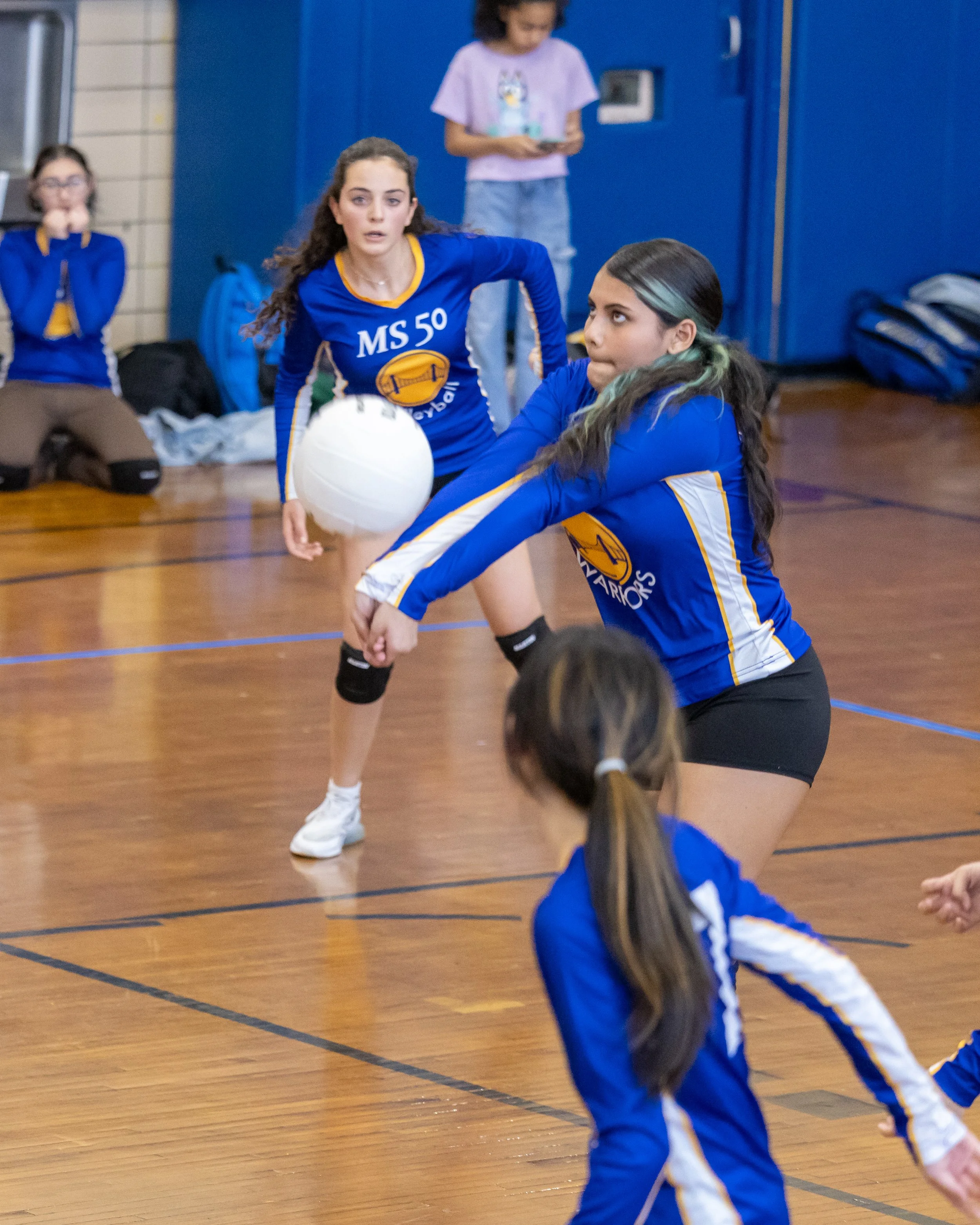 MS 50 students playing volleyball