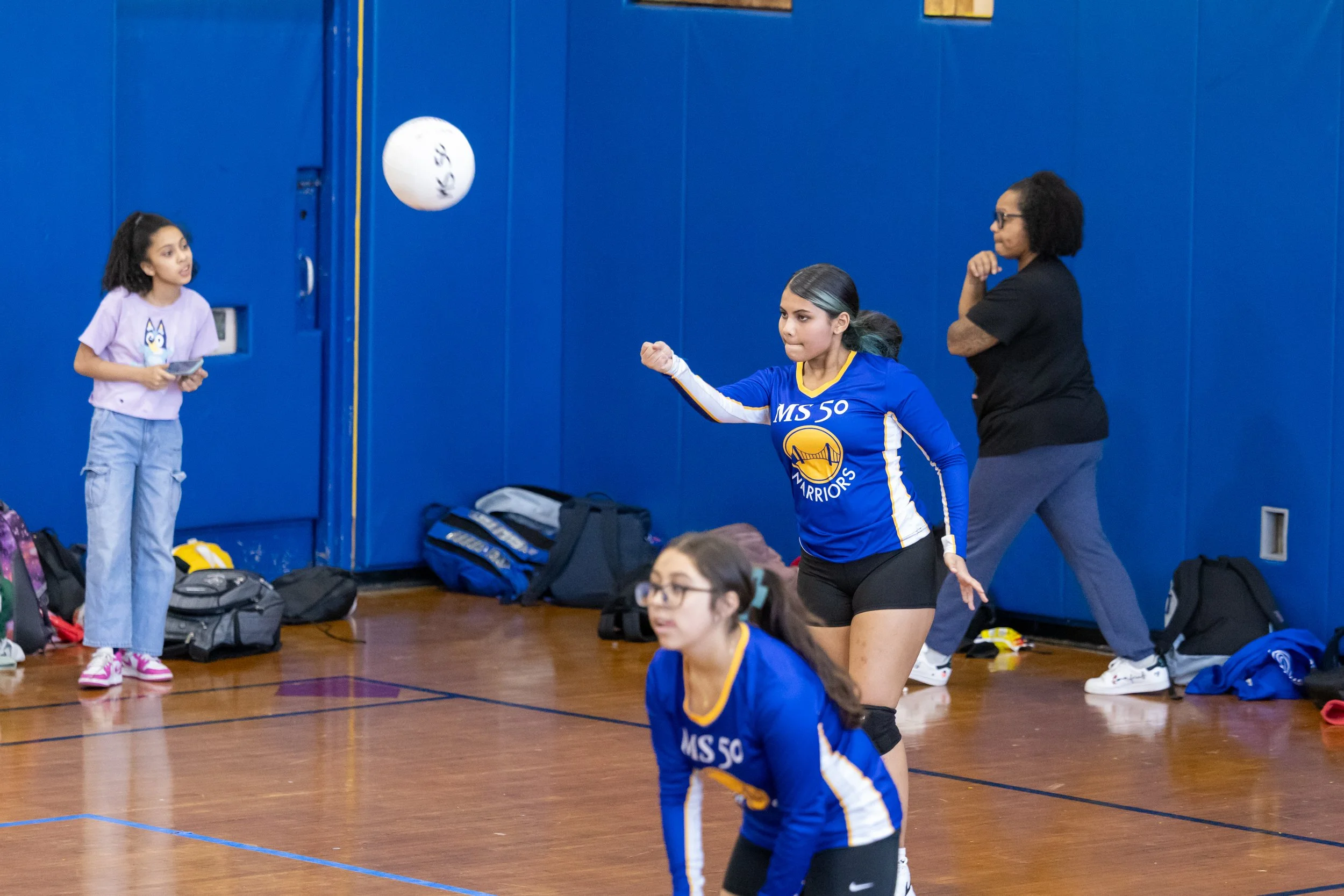 MS 50 students playing volleyball