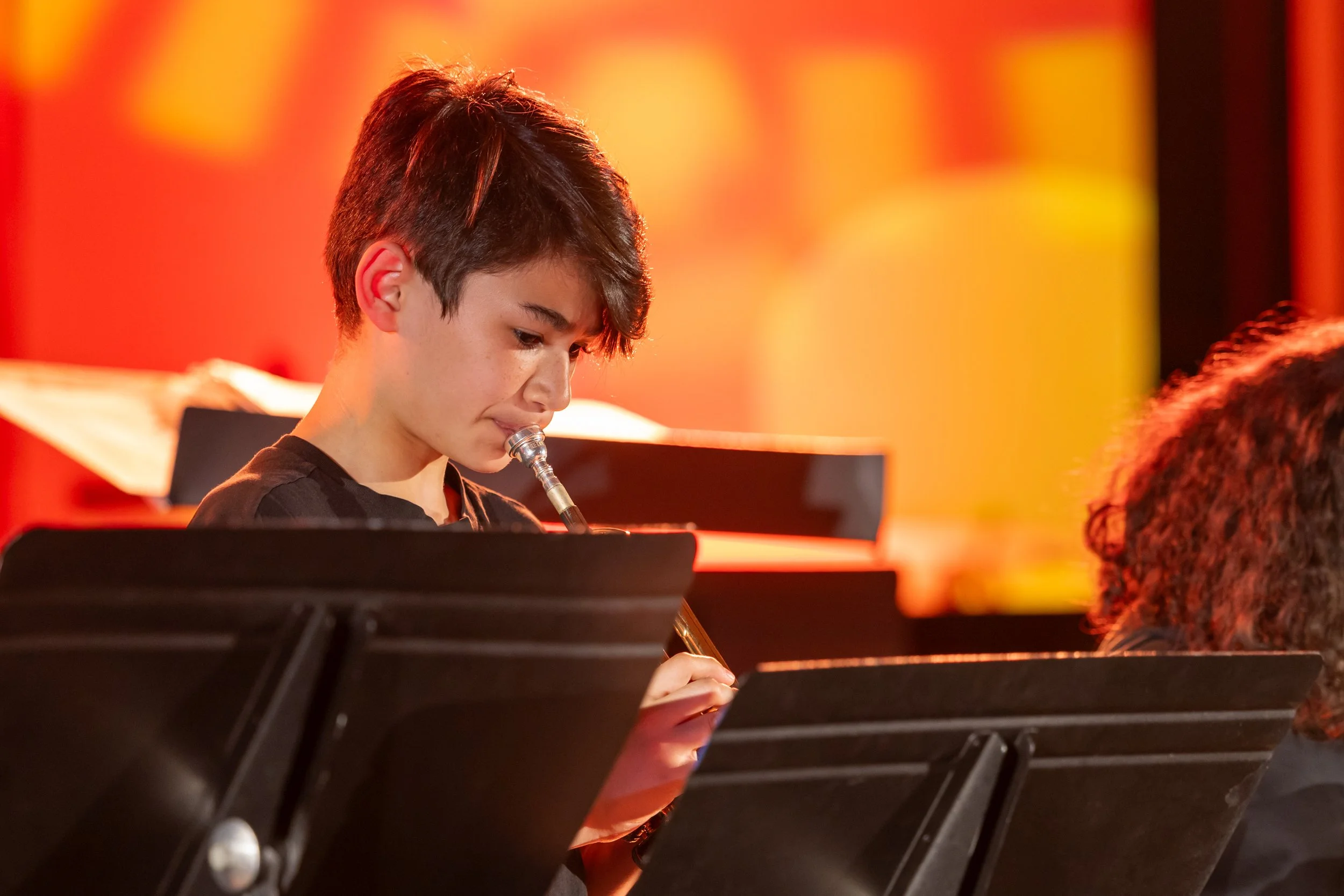 middle school students perform in band concert