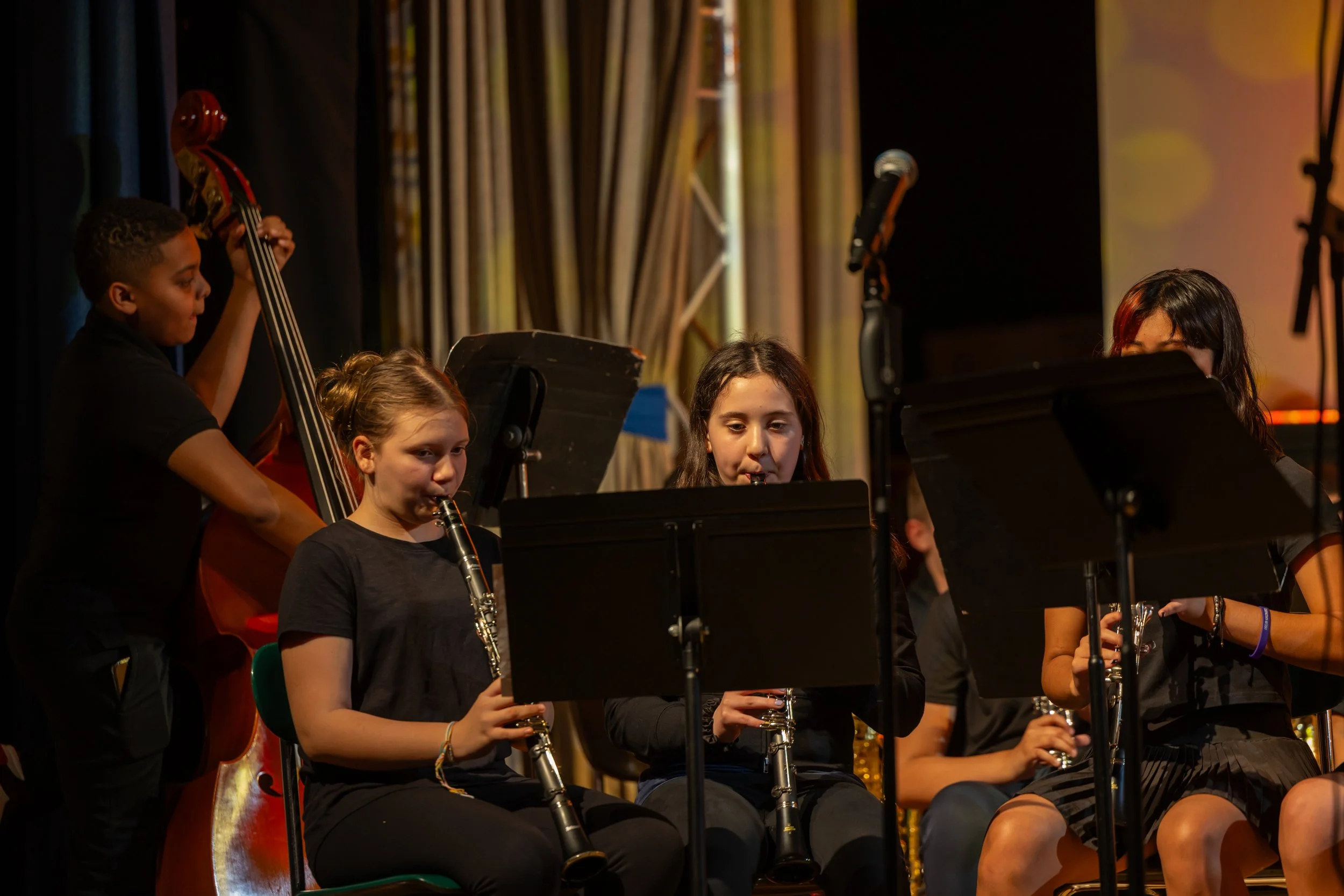 middle school students perform in band concert