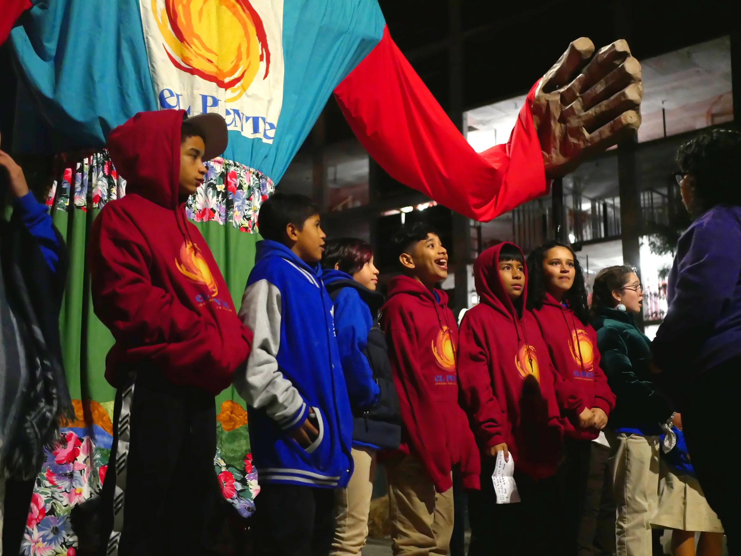 student smiles up at Anelin