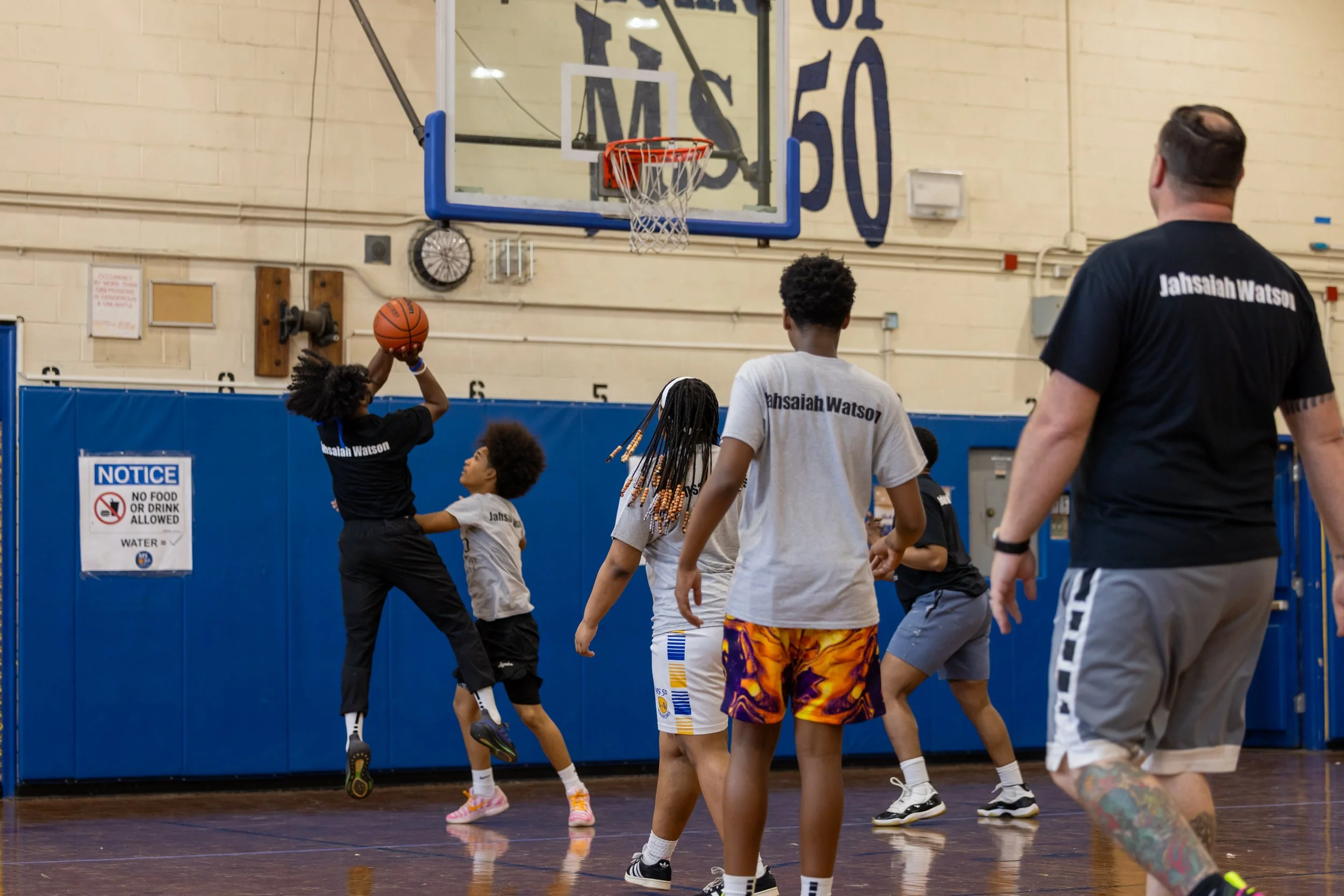 student versus staff basketball game