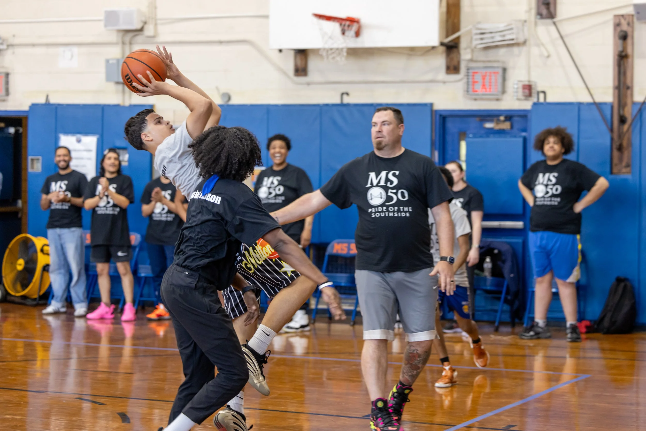 student versus staff basketball game