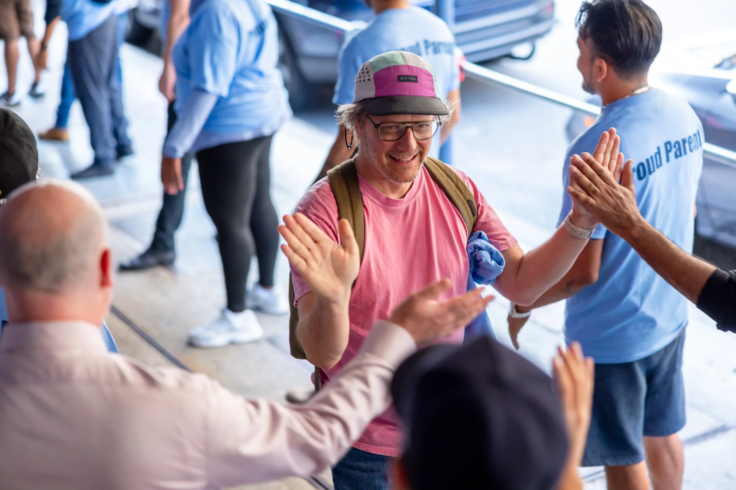 Students get high fives from parents