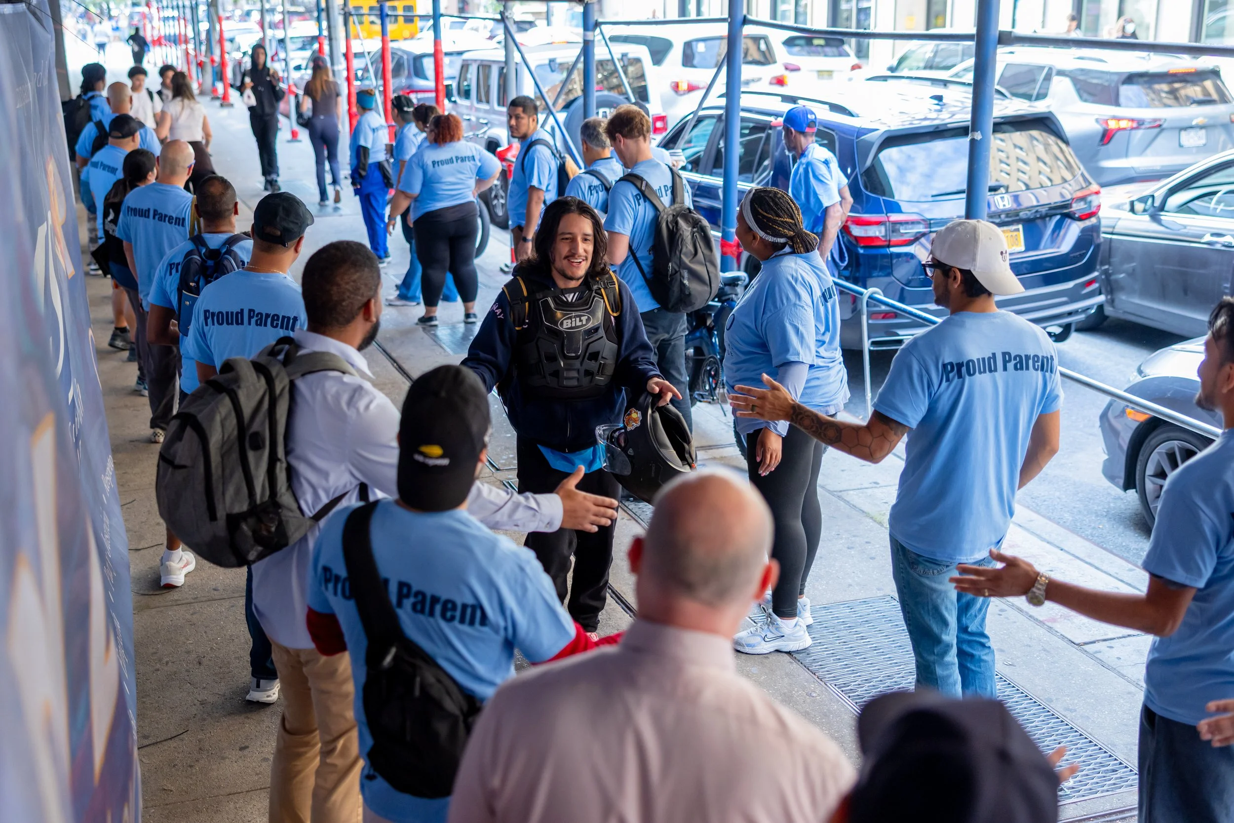 Students get high fives from parents