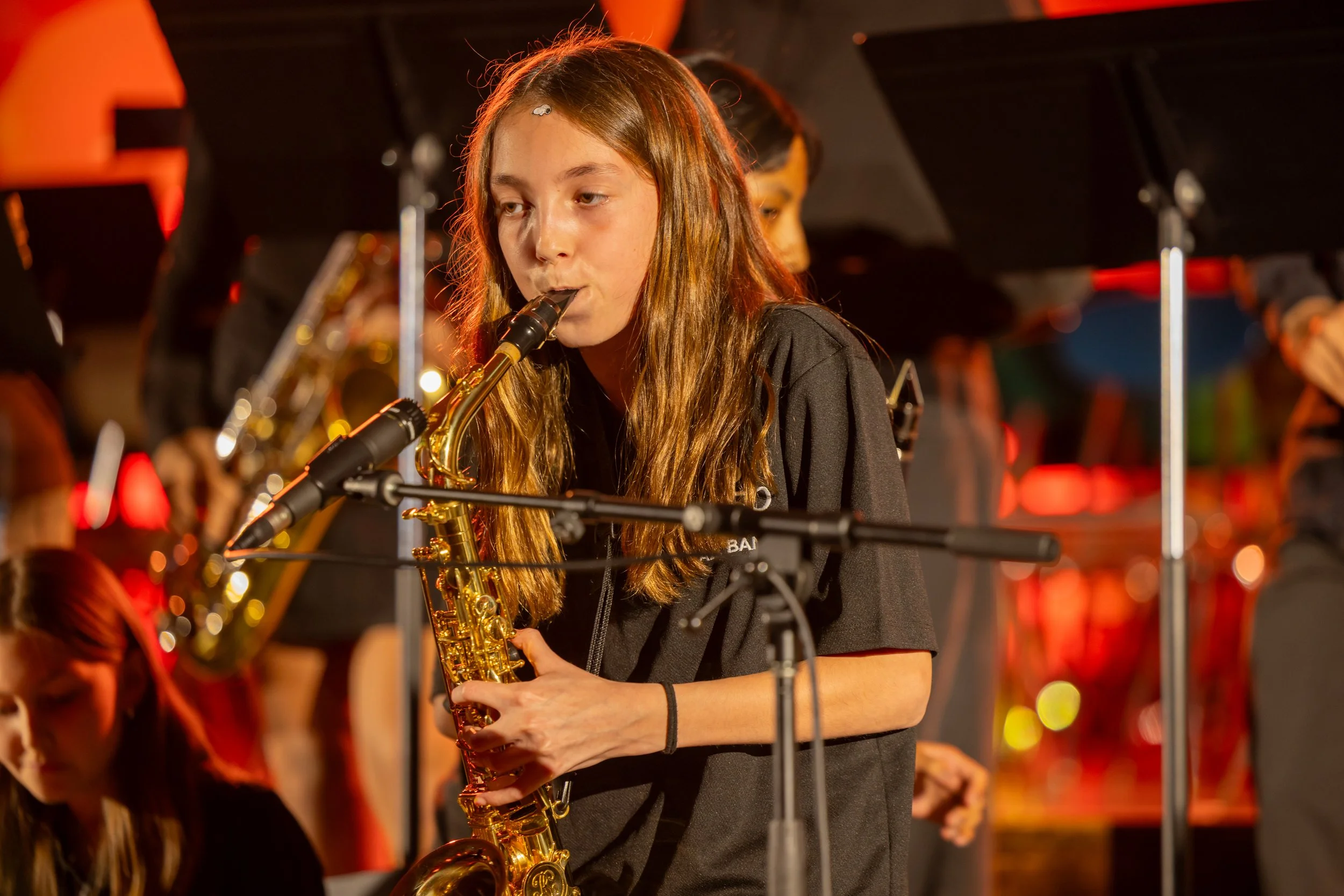 middle school students perform in band concert
