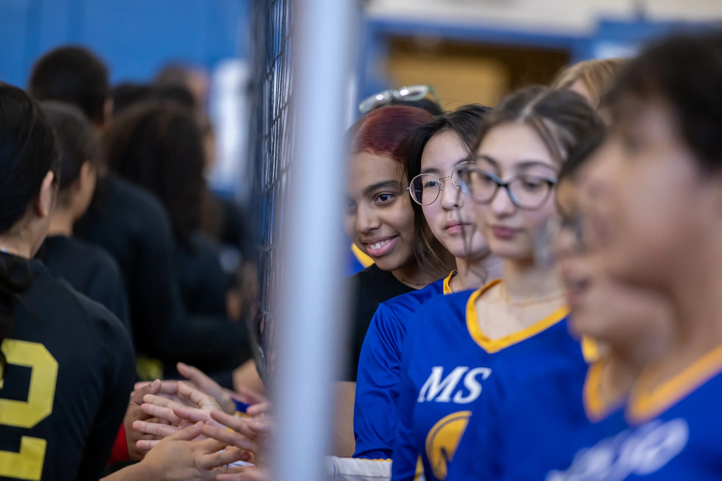 MS 50 students playing volleyball