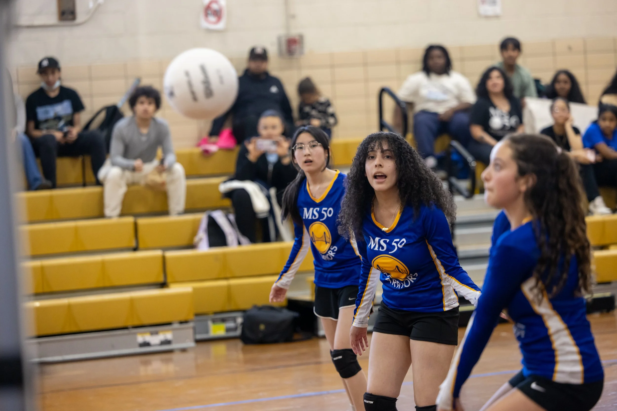 MS 50 students playing volleyball