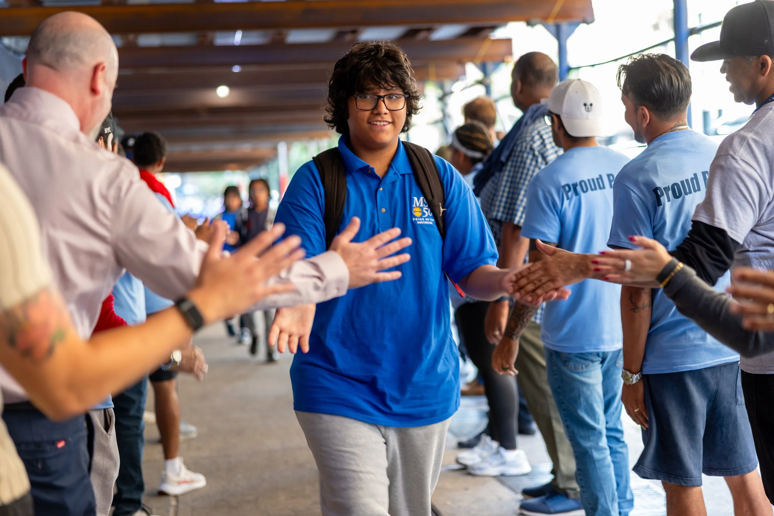 Students get high fives from parents