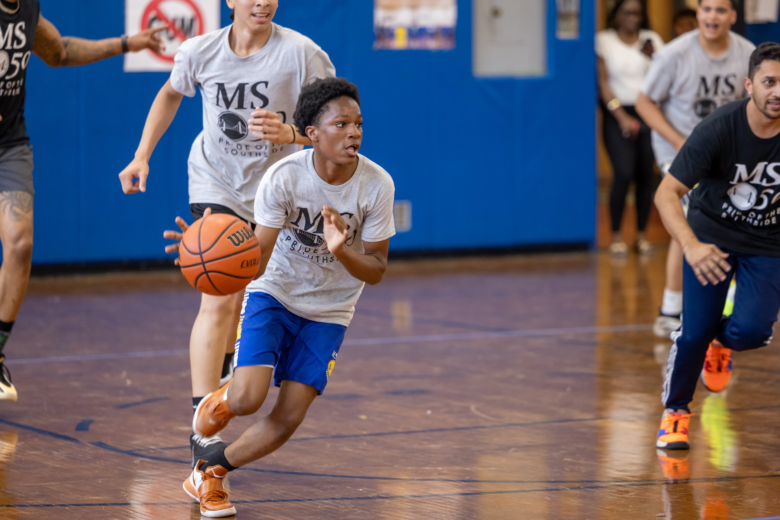 student versus staff basketball game