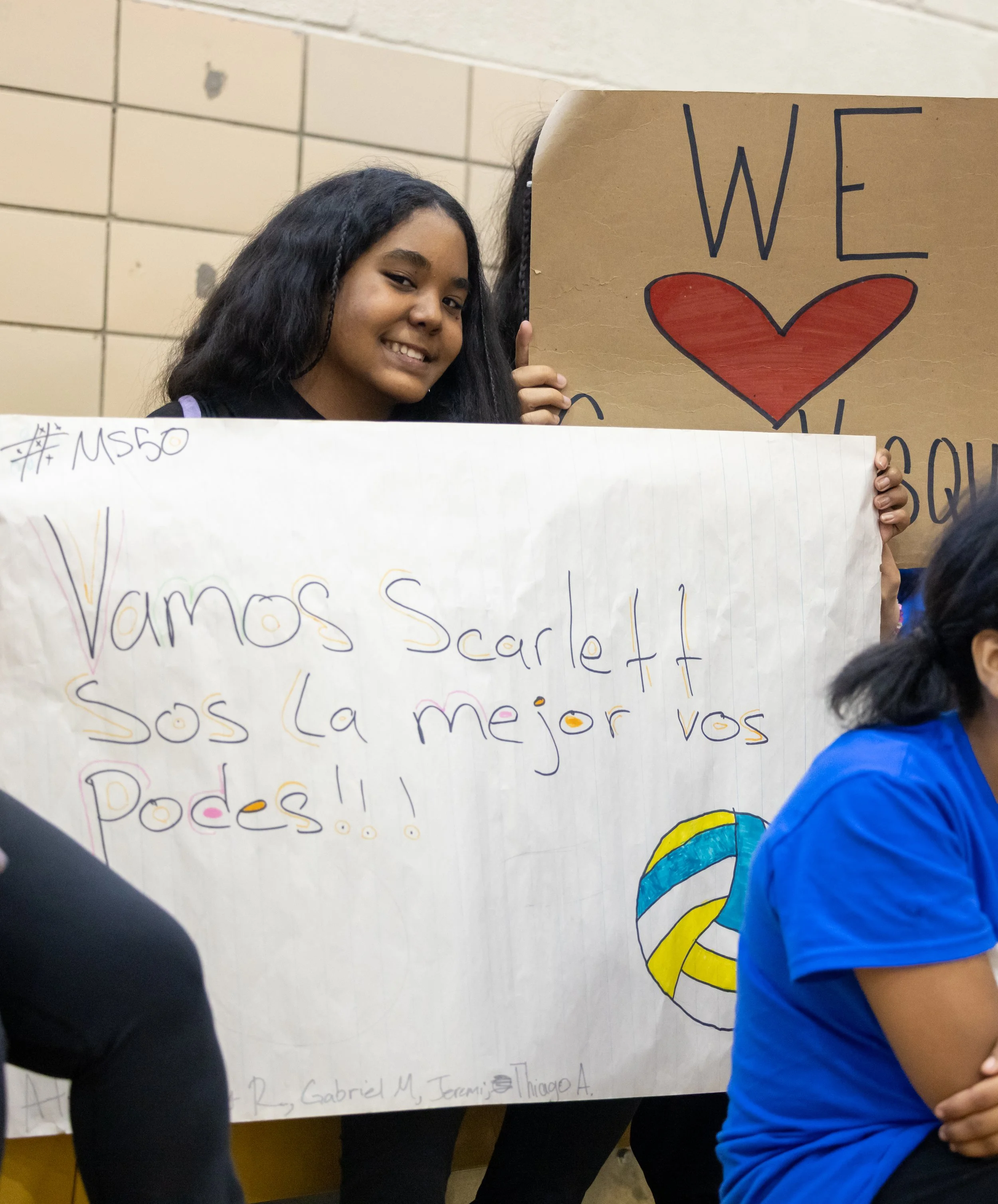 MS 50 students watching volleyball