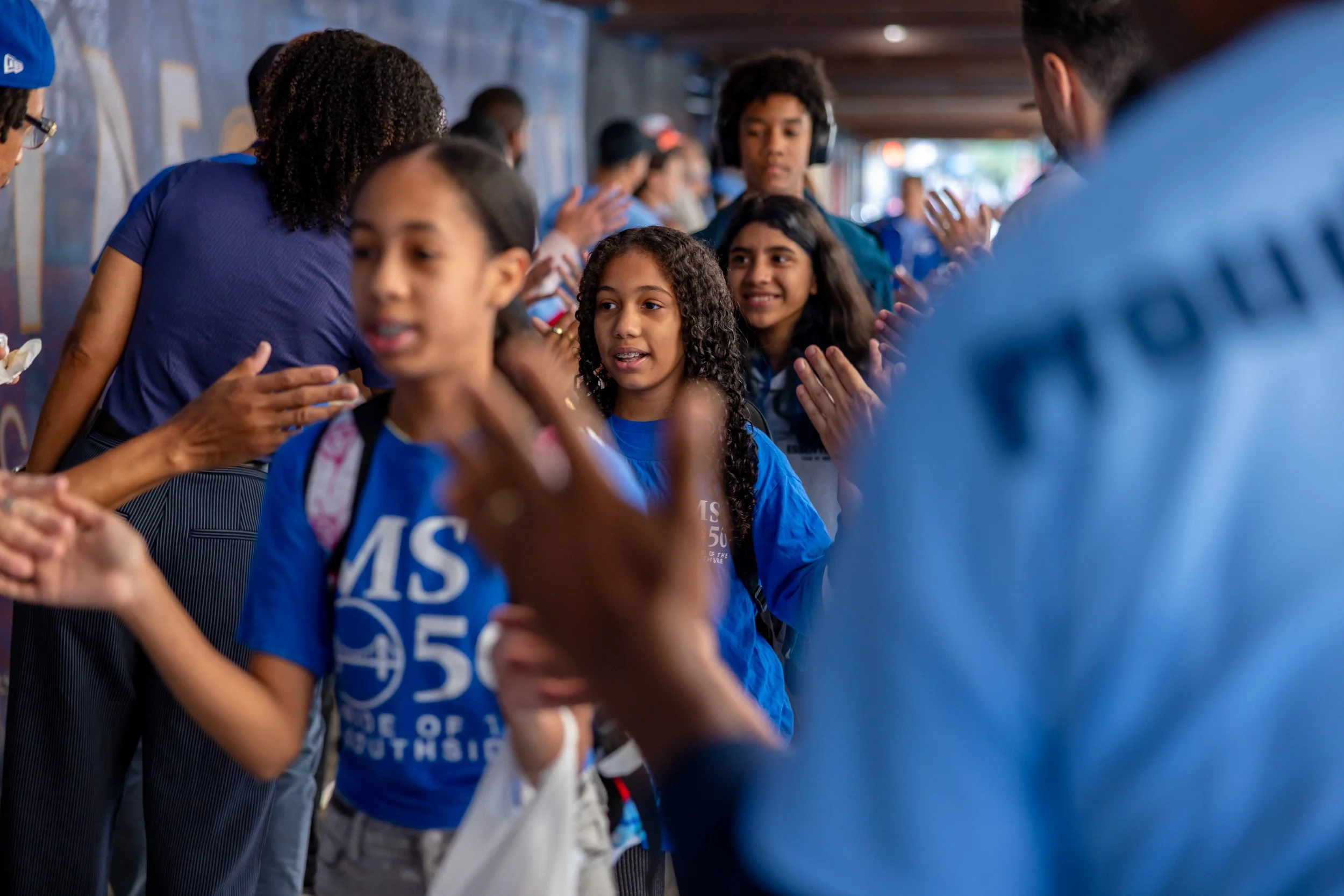 Students get high fives from parents