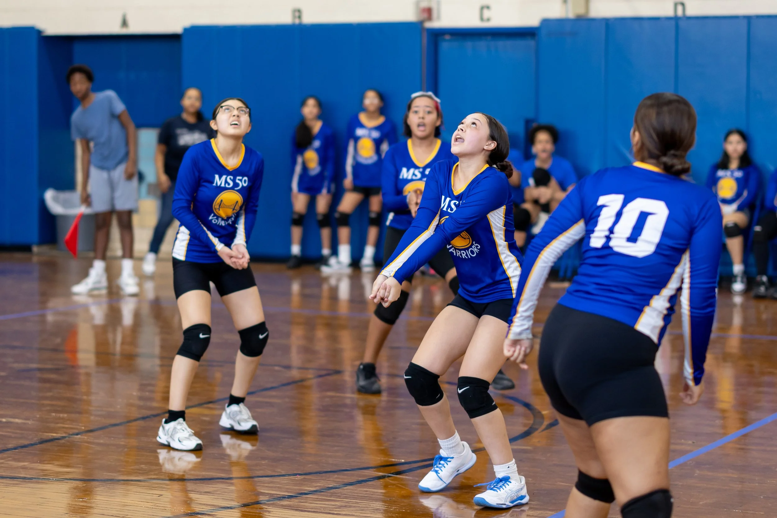 Students playing volleyball