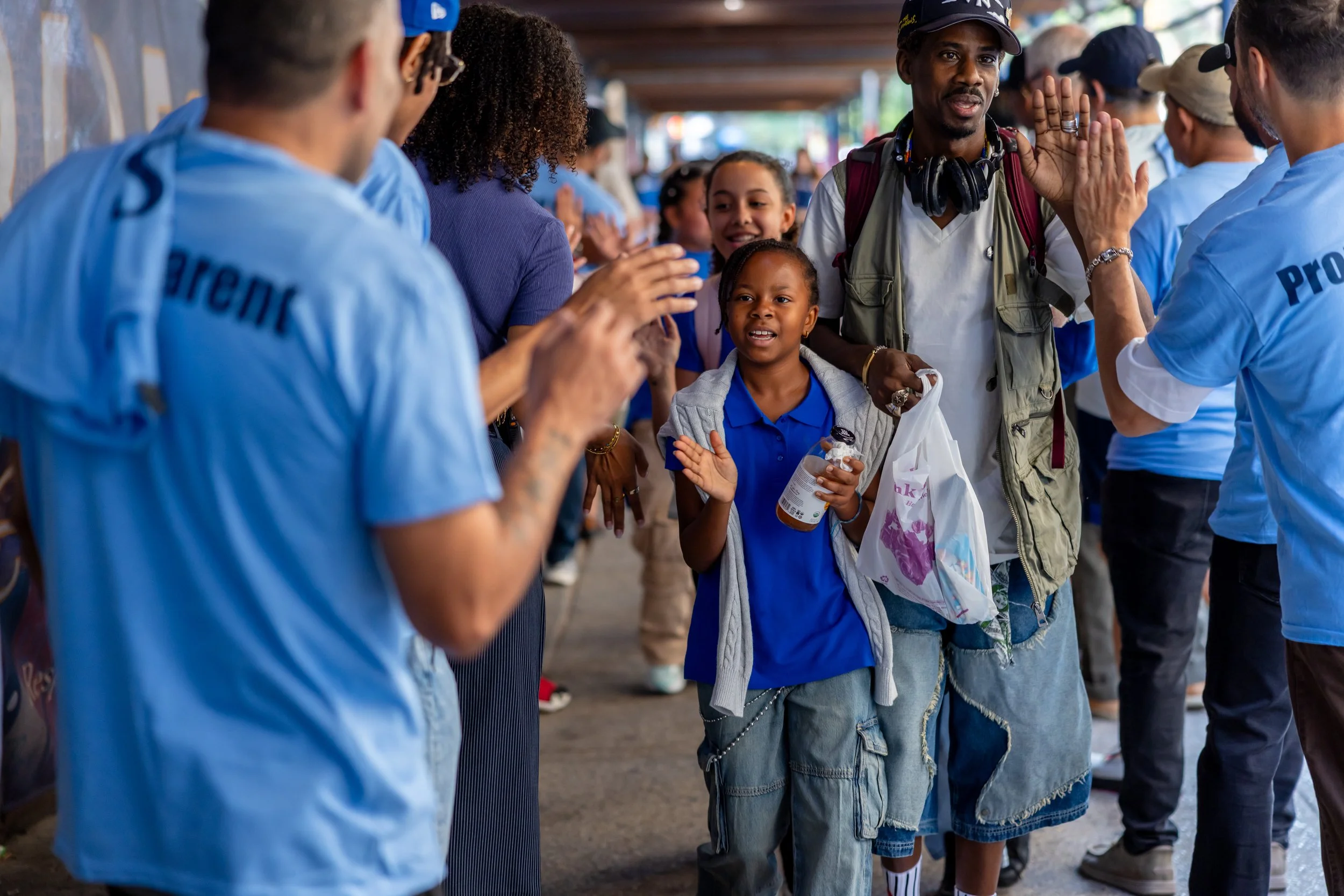 Students get high fives from parents