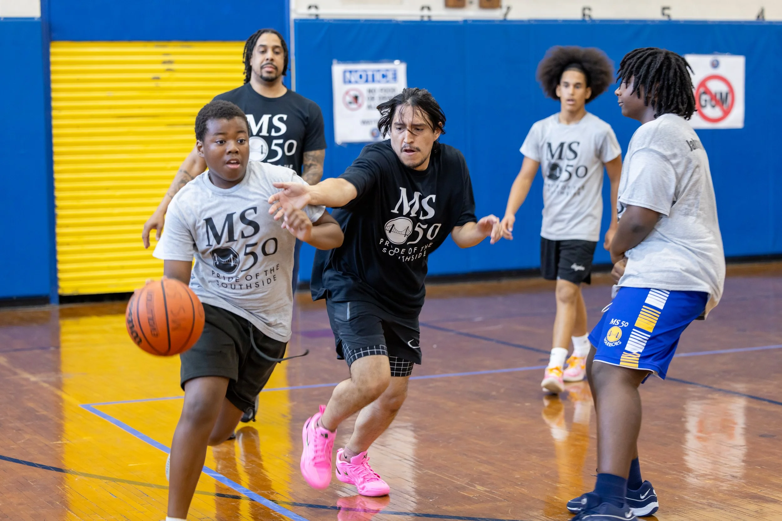 student versus staff basketball game