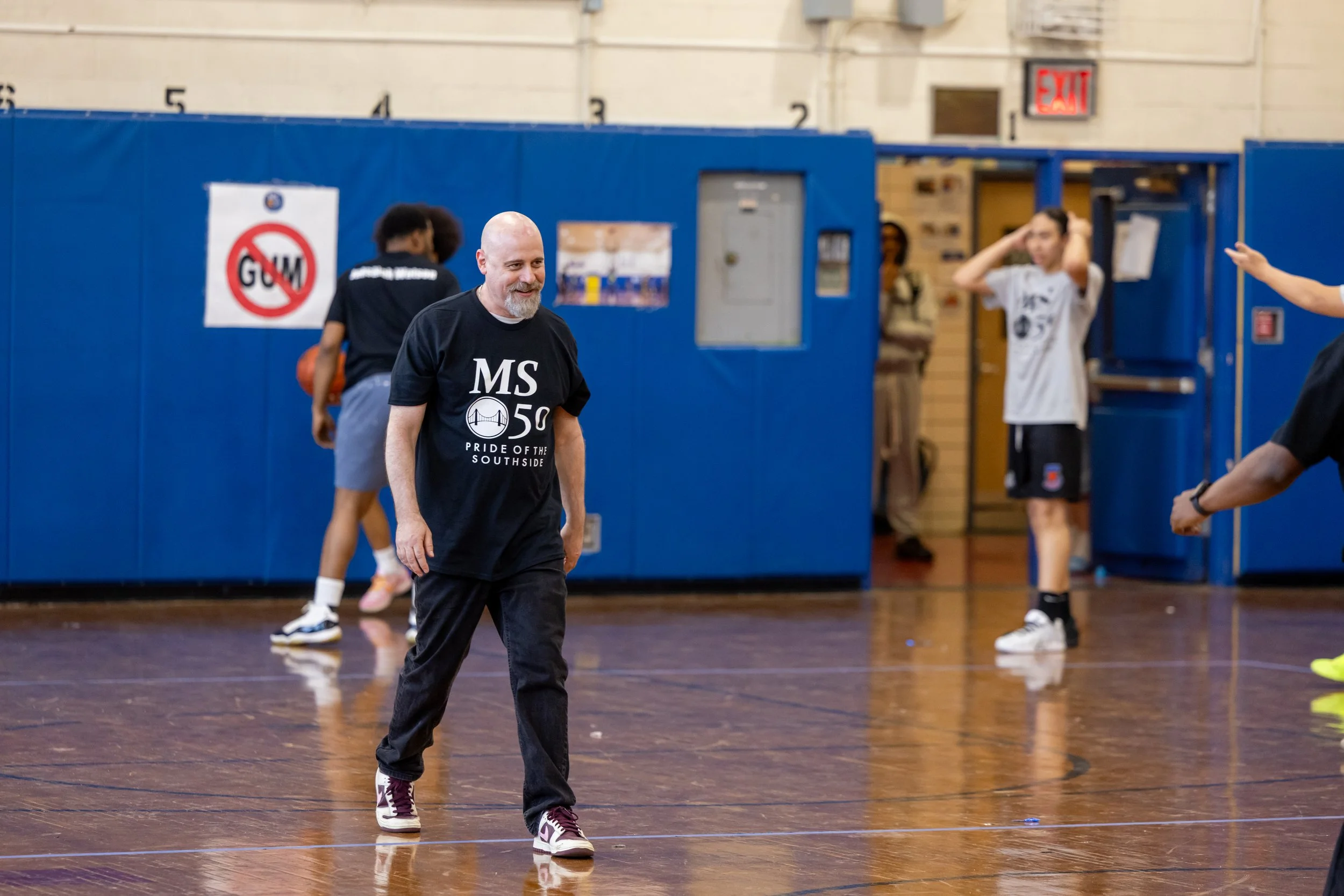 student versus staff basketball game