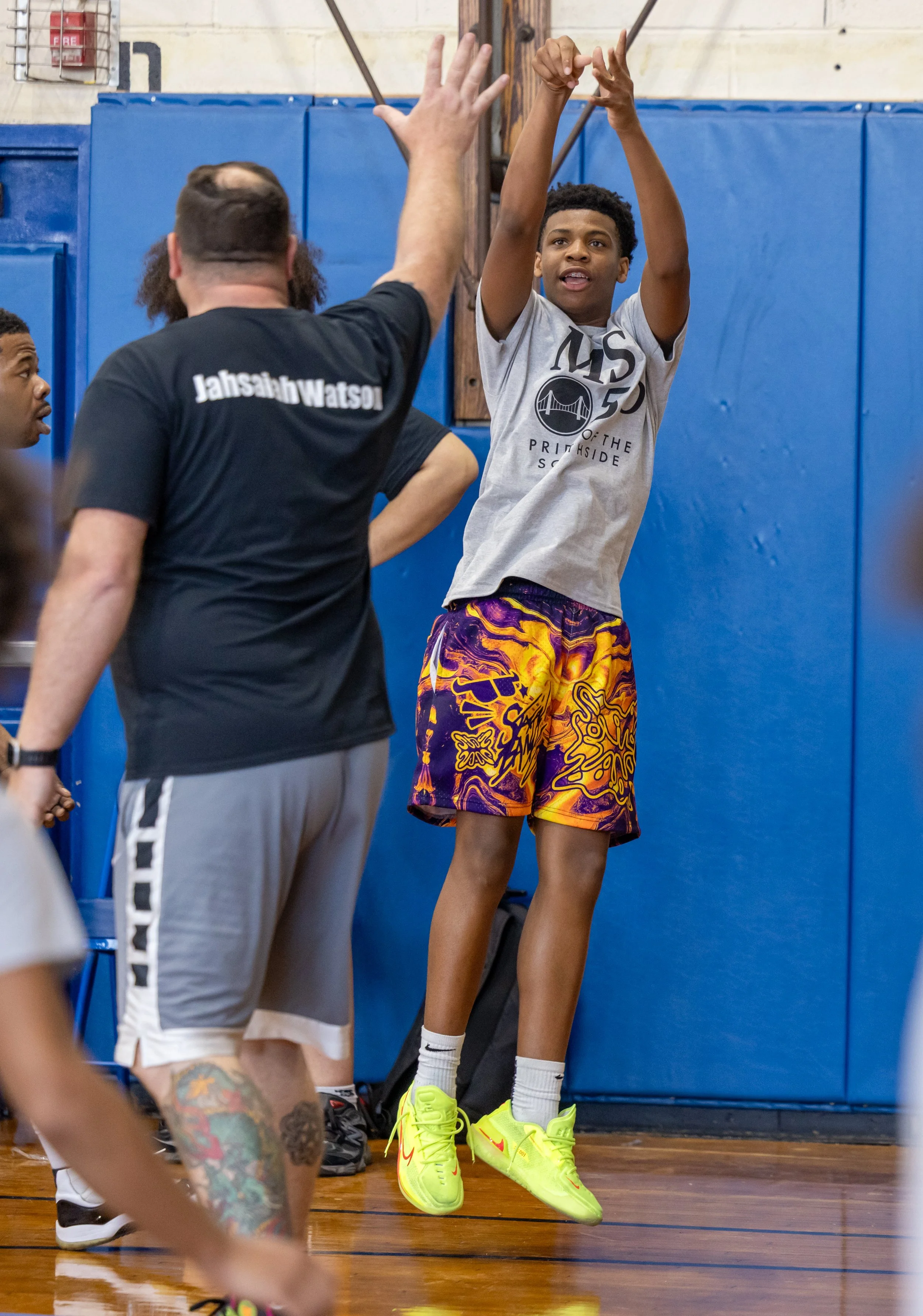 student versus staff basketball game